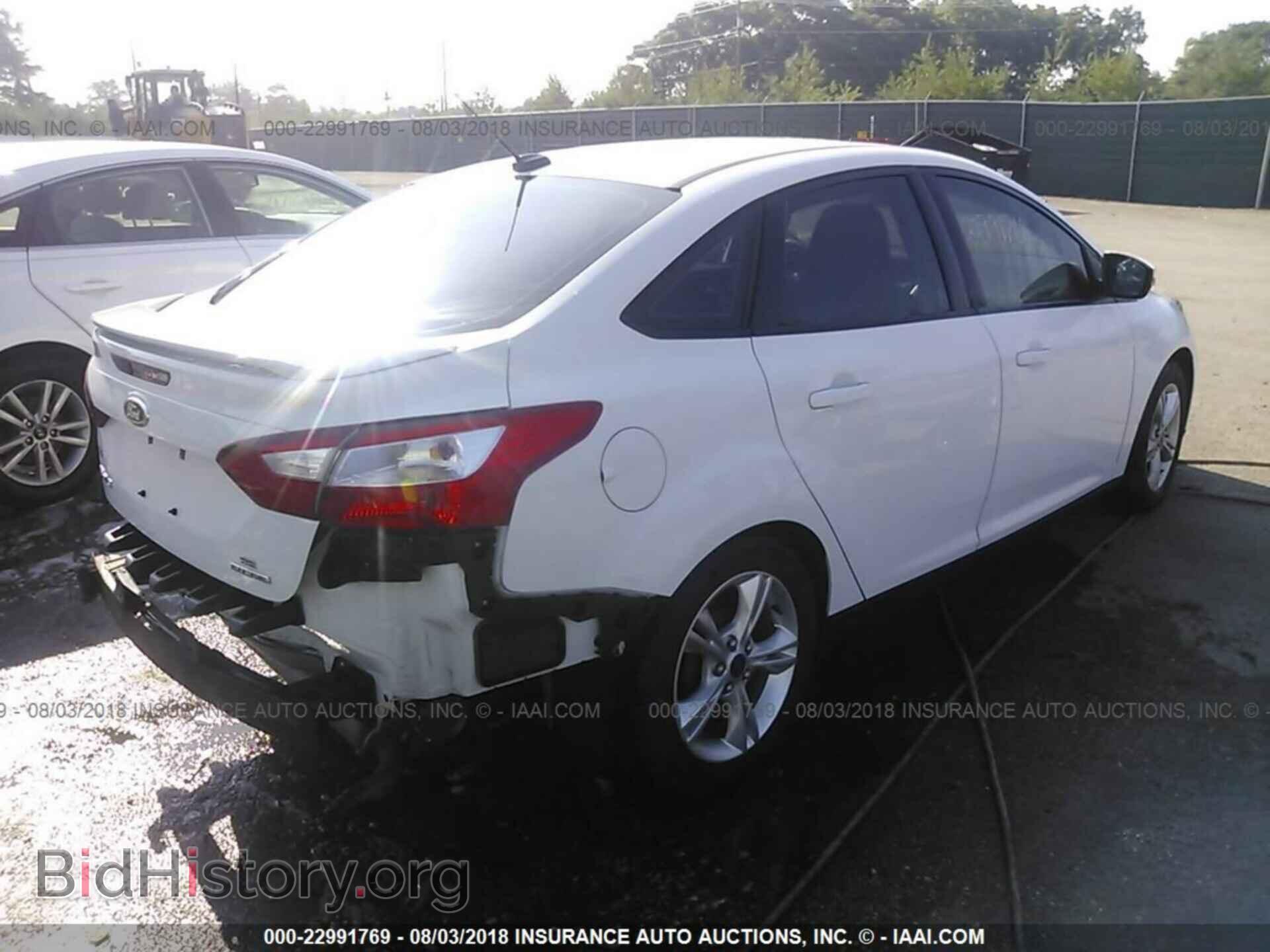 2014 Ford Focus - VIN: 1FADP3F20EL265116 - Фото 4