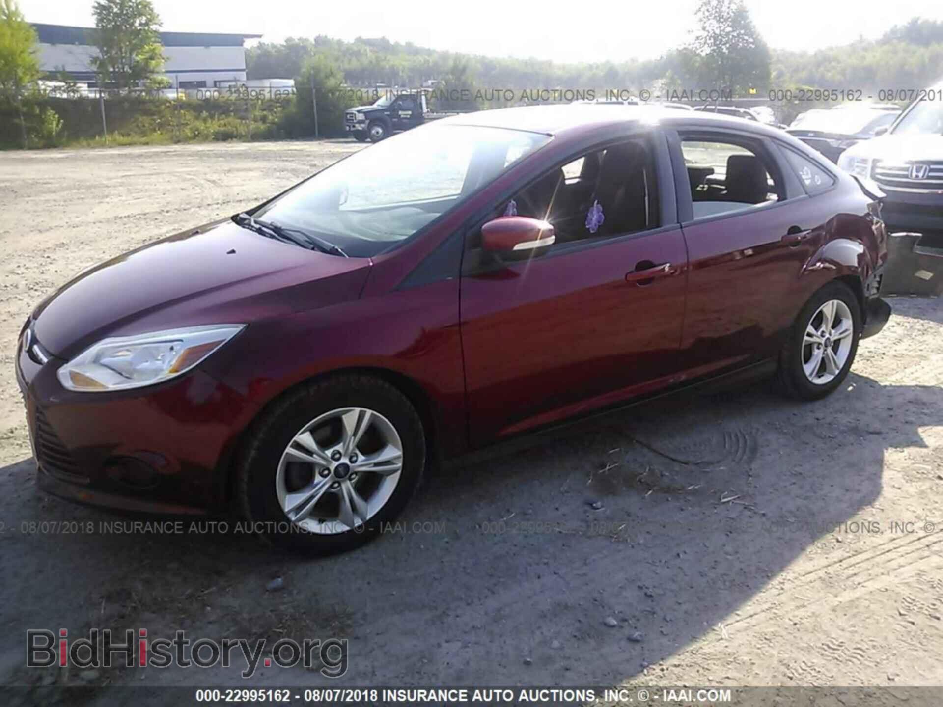 2014 Ford Focus - VIN: 1FADP3F21EL344200 - Фото 2