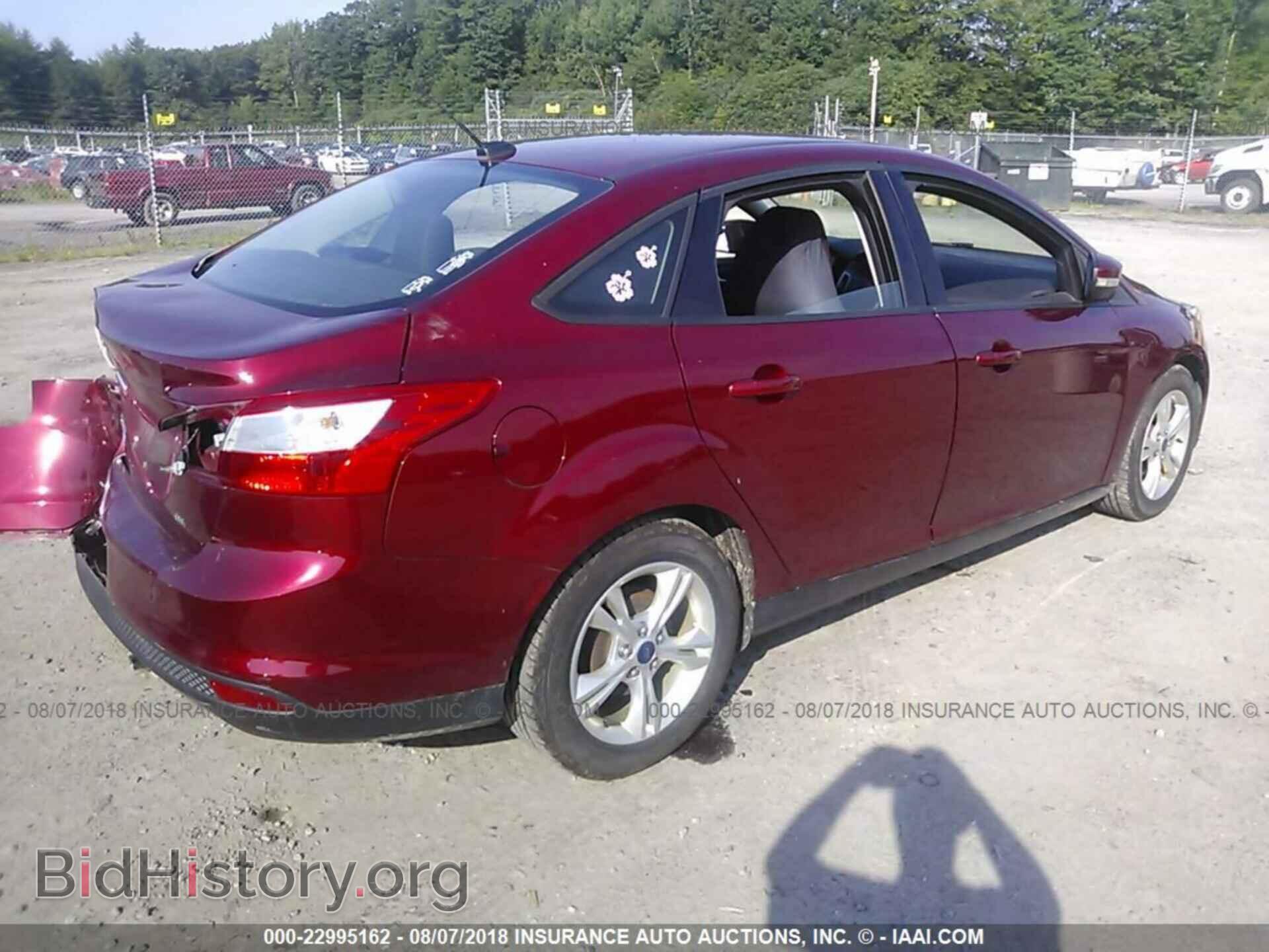 2014 Ford Focus - VIN: 1FADP3F21EL344200 - Фото 4