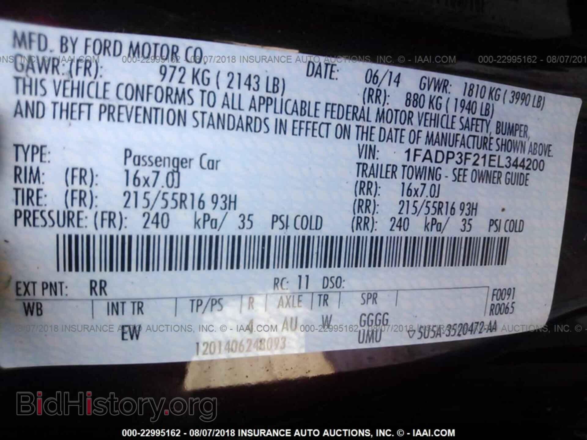 2014 Ford Focus - VIN: 1FADP3F21EL344200 - Фото 9