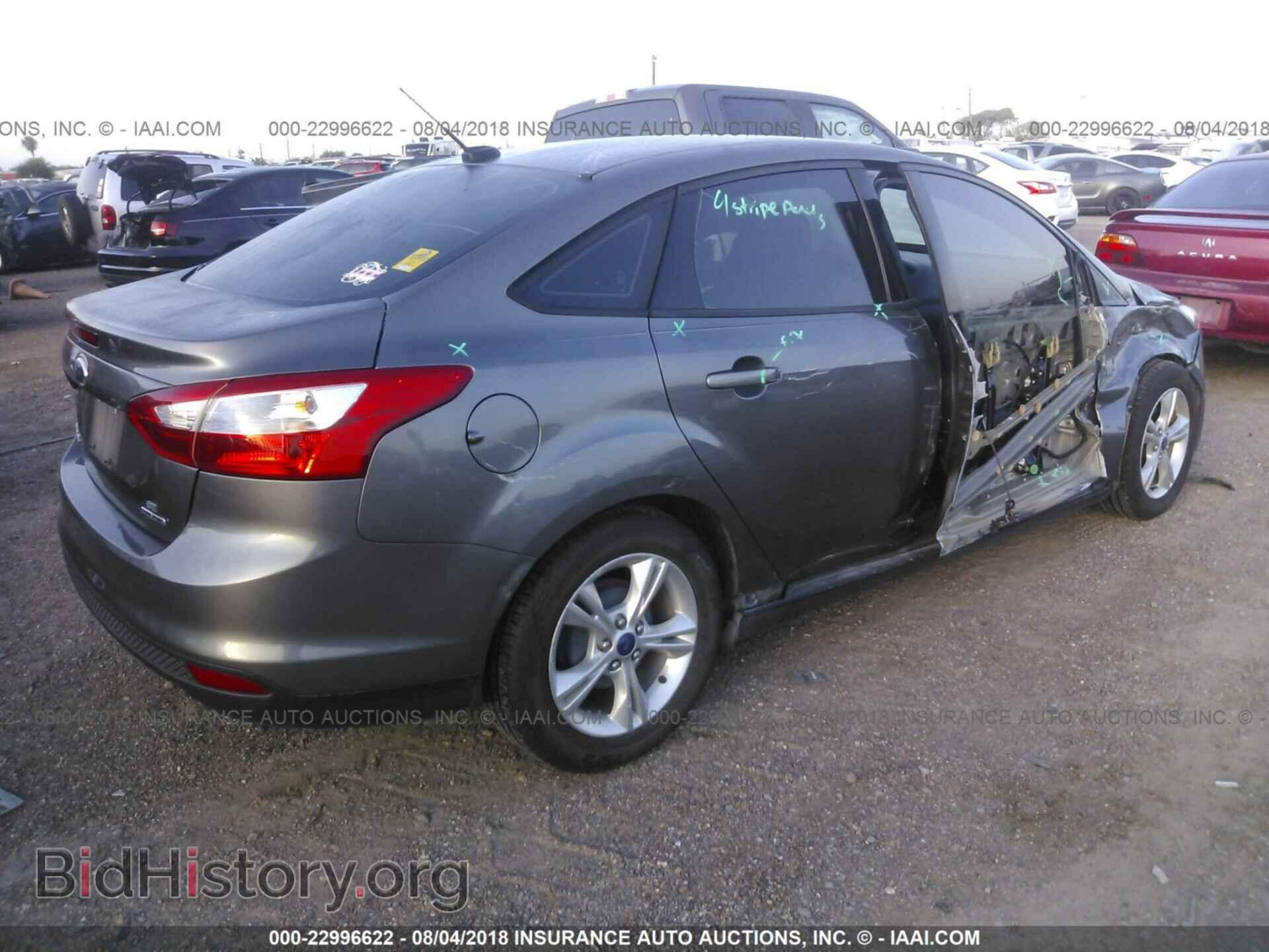 2014 Ford Focus - VIN: 1FADP3F25EL108987 - Photo 4