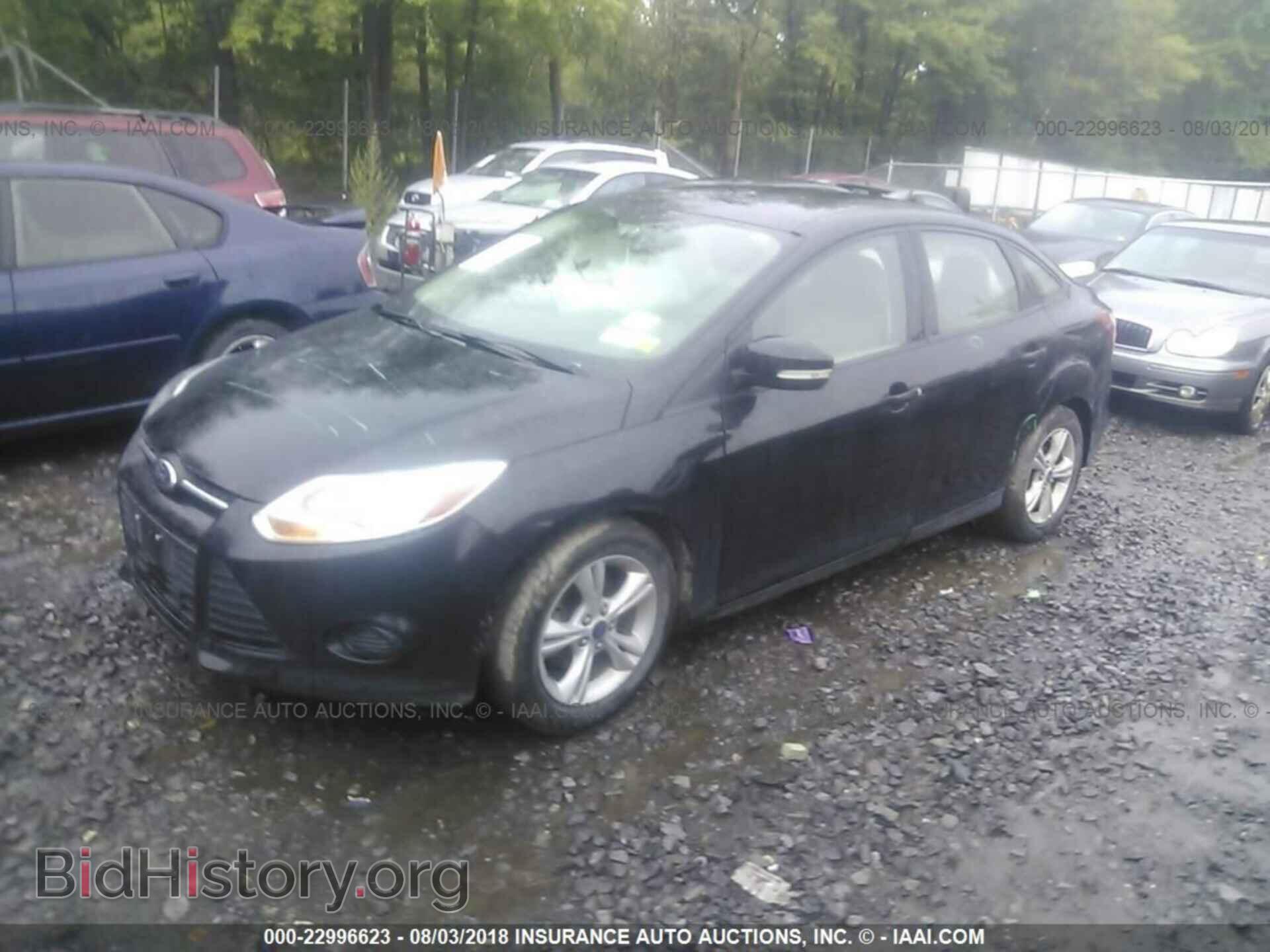 2014 Ford Focus - VIN: 1FADP3F27EL424729 - Photo 2