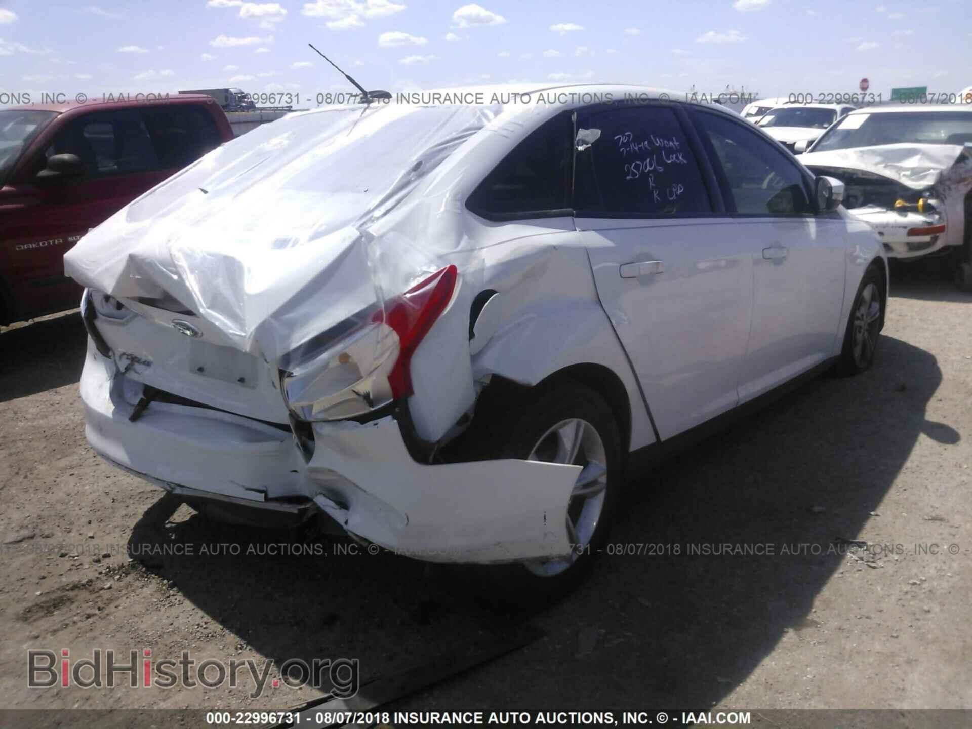 2014 FORD FOCUS - VIN: 1FADP3F20EL451934 - Photo 4