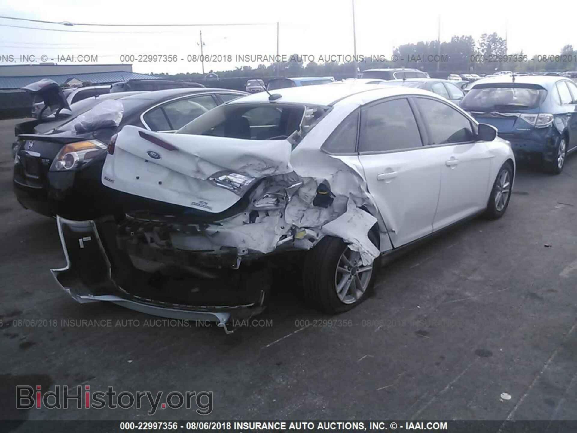 2016 Ford Focus - VIN: 1FADP3F25GL397825 - Photo 4