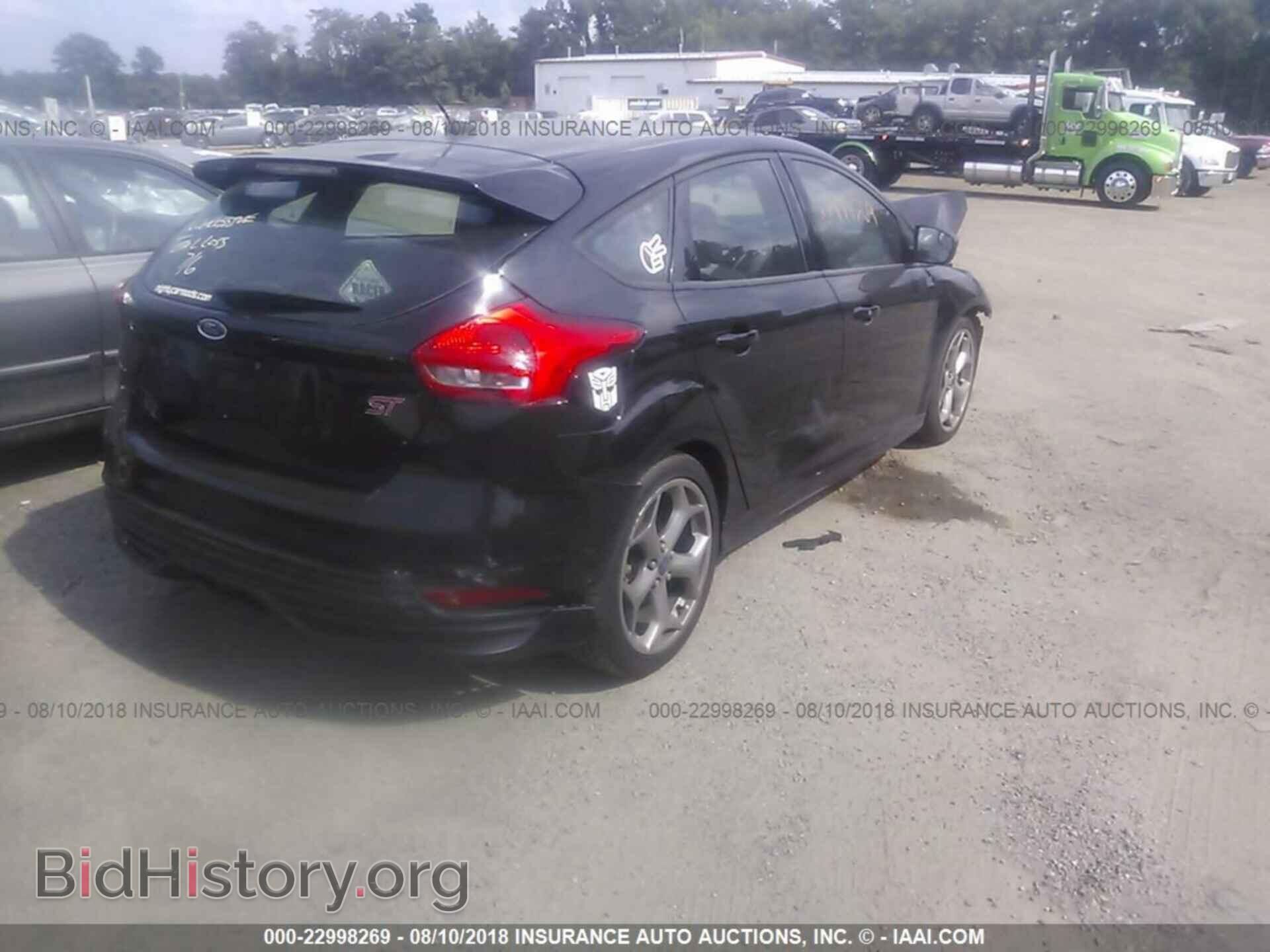 2016 Ford Focus - VIN: 1FADP3L94GL402711 - Photo 4