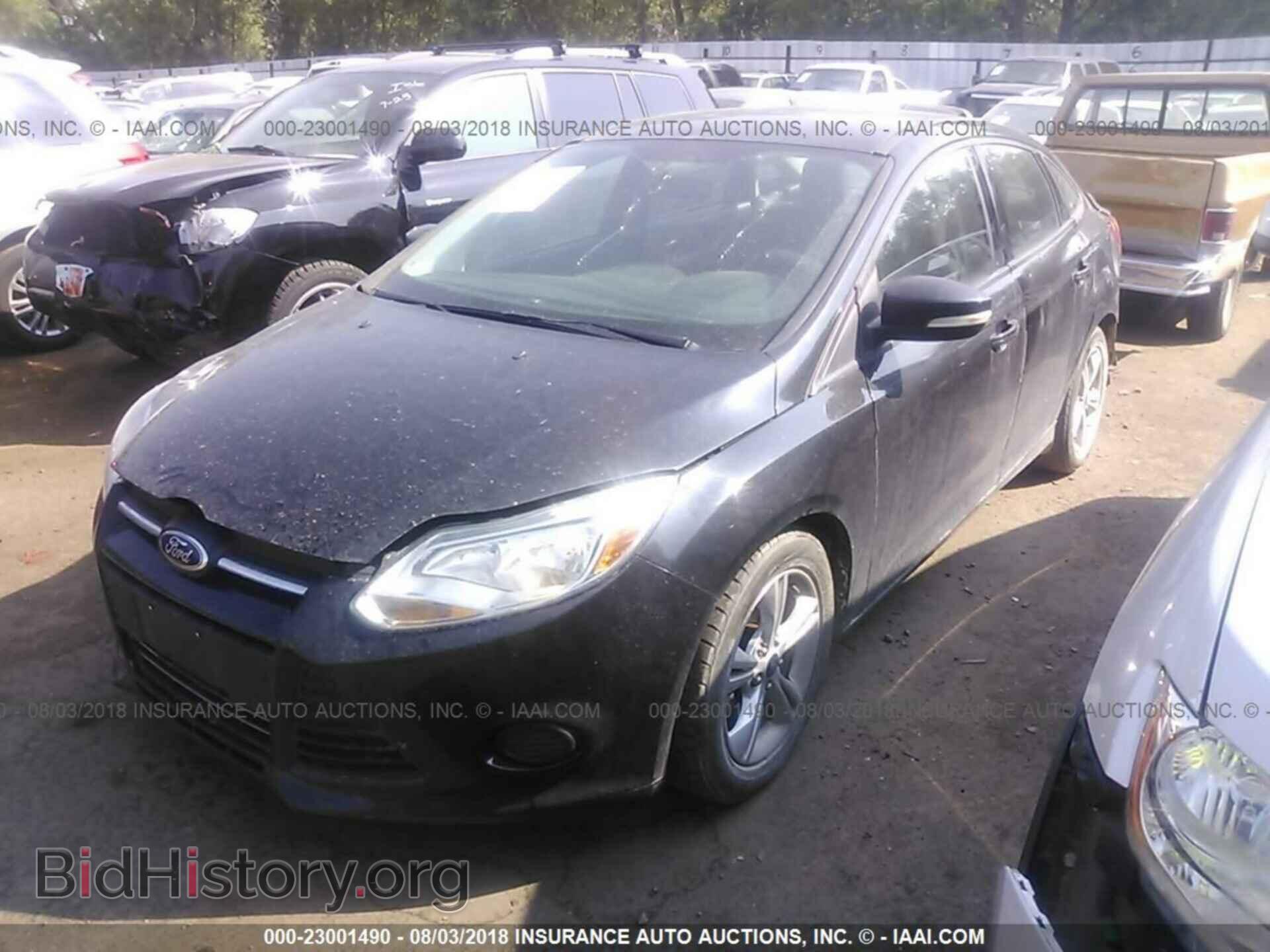 2014 Ford Focus - VIN: 1FADP3F29EL239288 - Фото 2