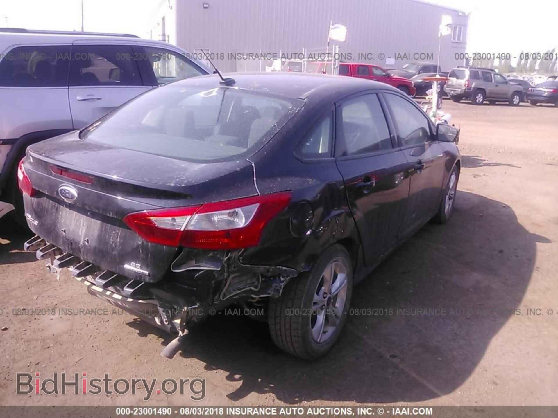 2014 Ford Focus - VIN: 1FADP3F29EL239288 - Фото 4