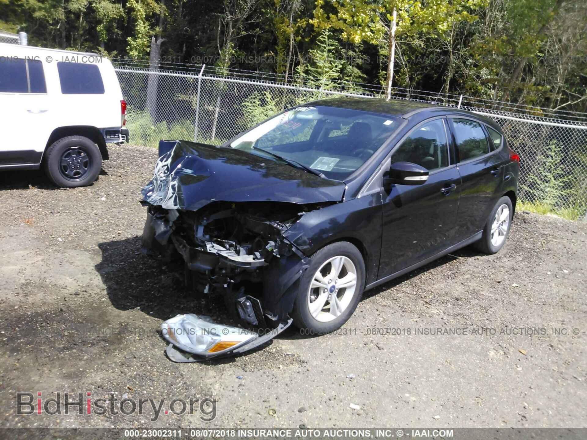 2014 Ford Focus - VIN: 1FADP3K29EL214302 - Photo 2