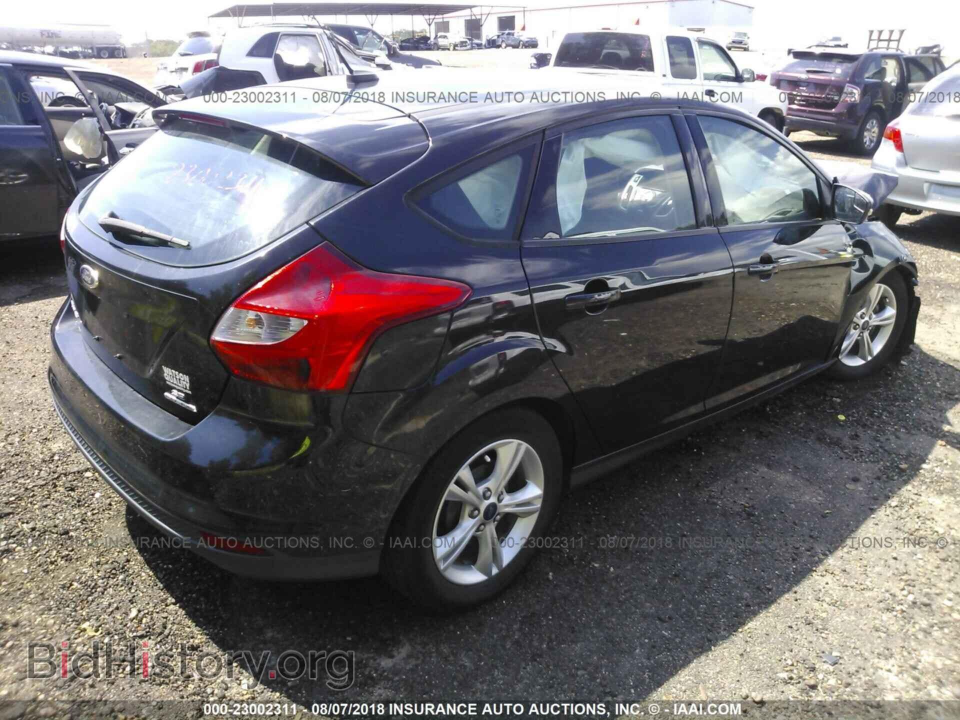 2014 Ford Focus - VIN: 1FADP3K29EL214302 - Photo 4