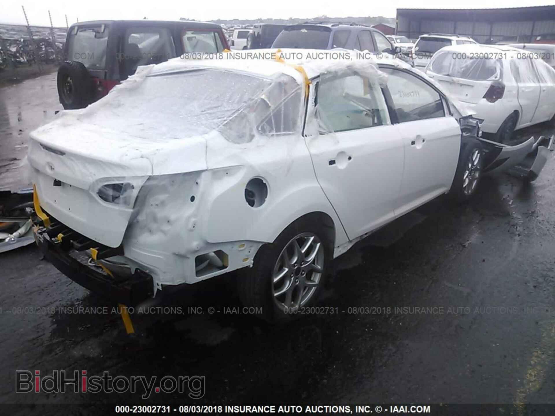 2015 FORD FOCUS - VIN: 1FADP3F23FL240986 - Photo 4