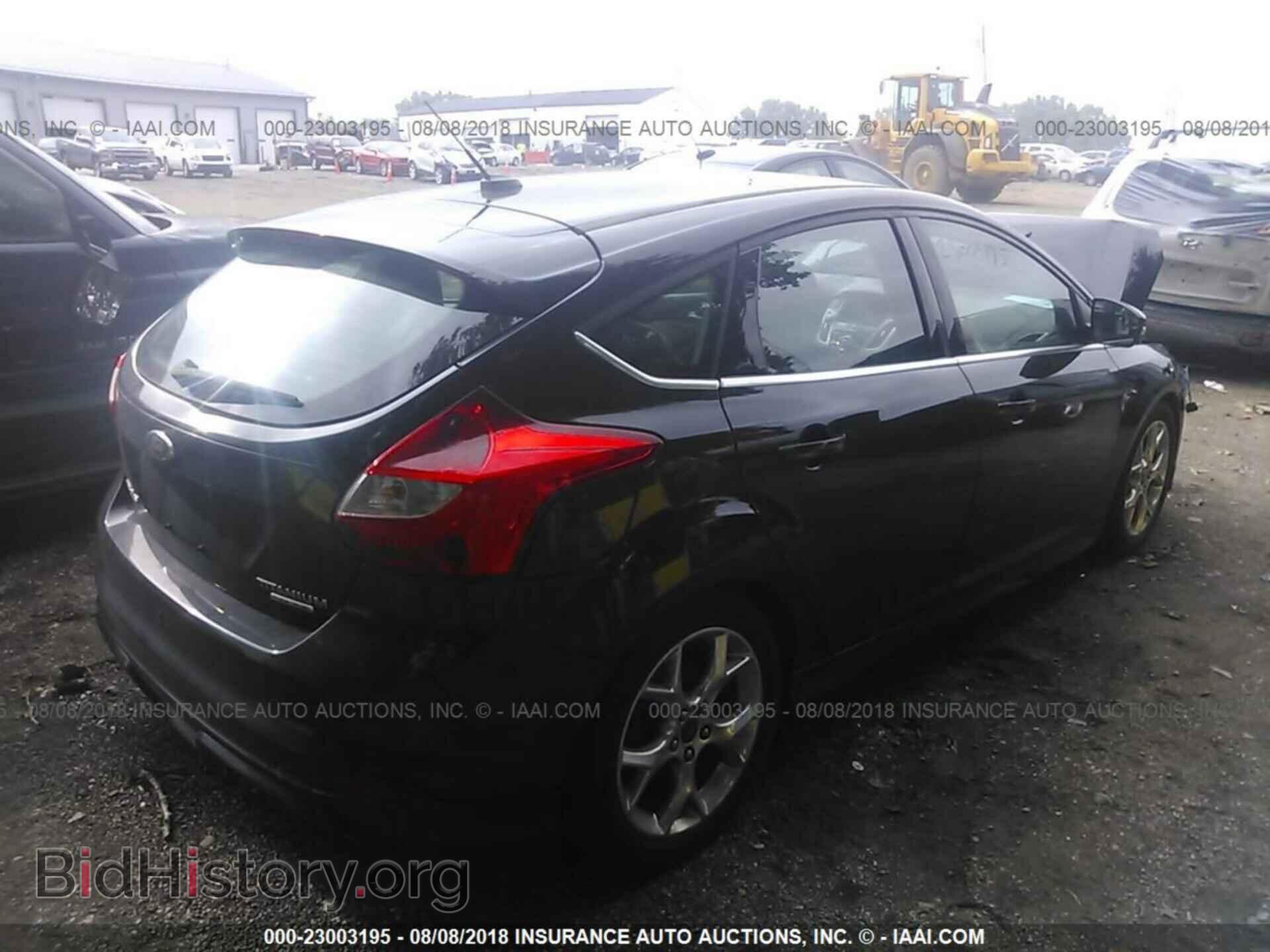 2014 Ford Focus - VIN: 1FADP3N21EL206318 - Фото 4