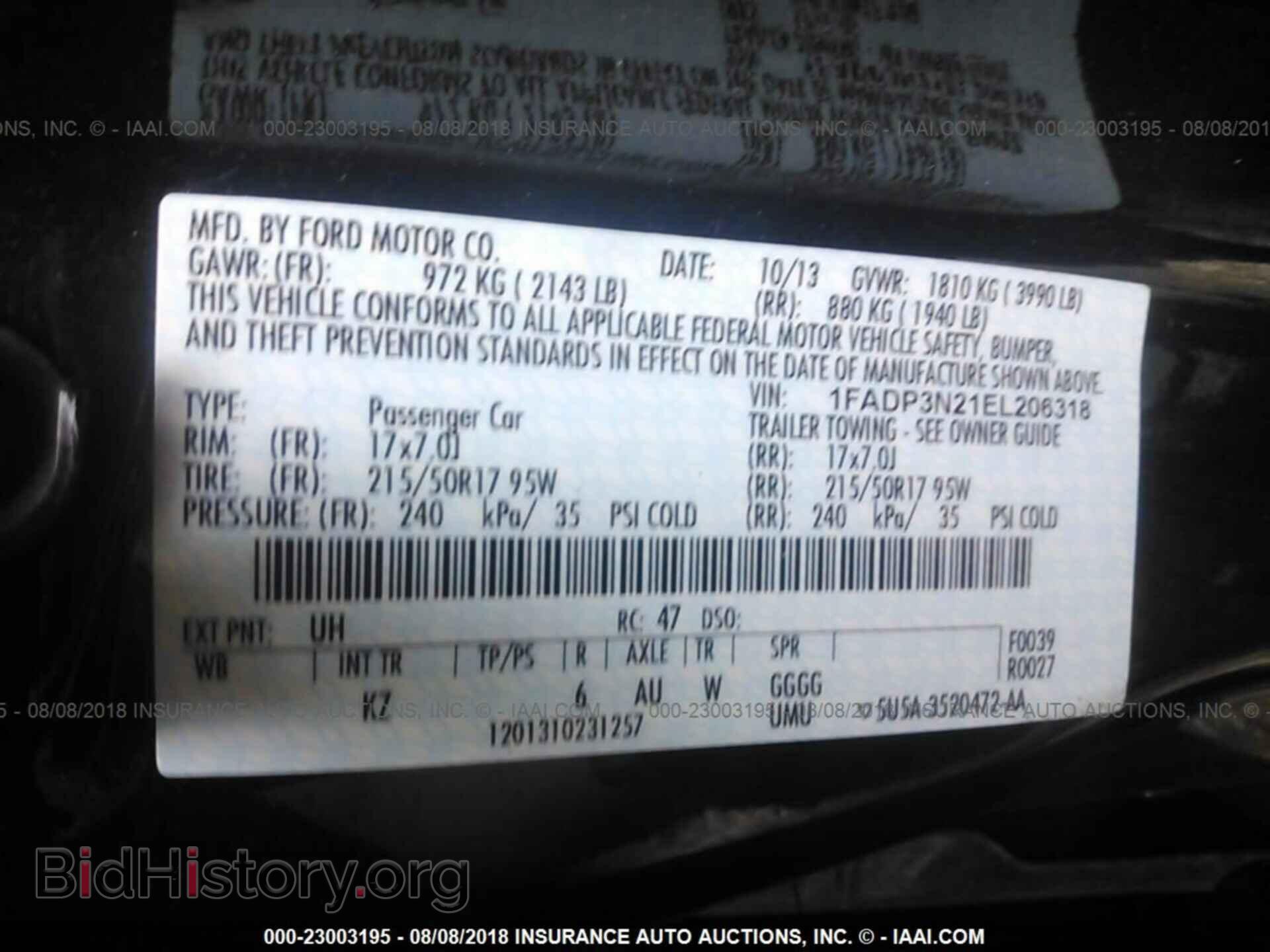 2014 Ford Focus - VIN: 1FADP3N21EL206318 - Фото 9