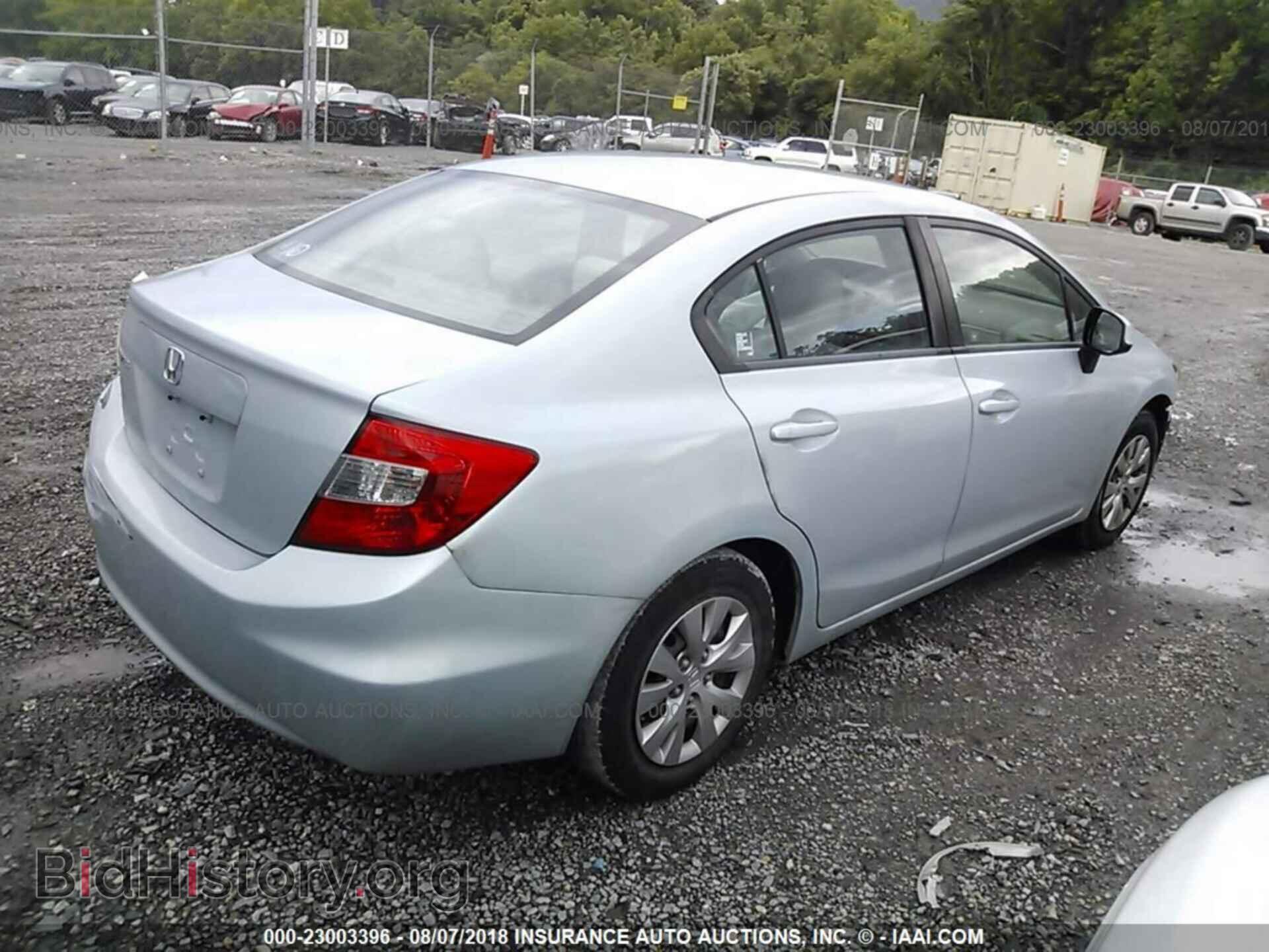 2012 Honda Civic - VIN: 2HGFB2F57CH591299 - Photo 4