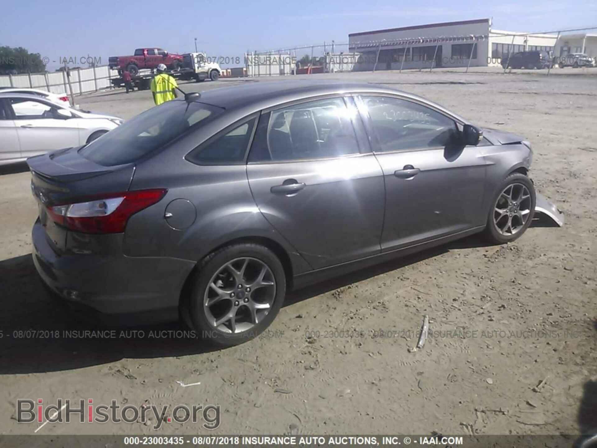 2013 Ford Focus - VIN: 1FADP3F26DL320358 - Photo 4
