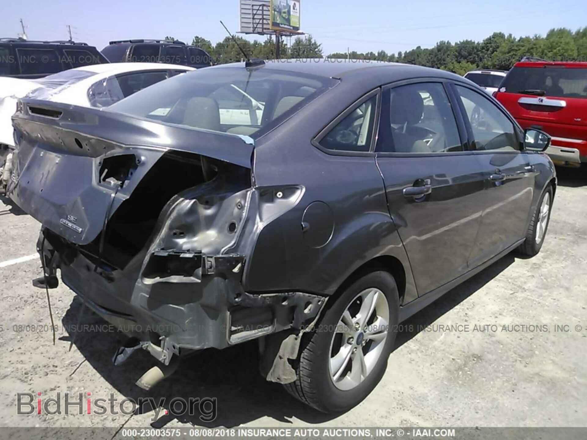 2014 Ford Focus - VIN: 1FADP3F26EL447077 - Фото 4