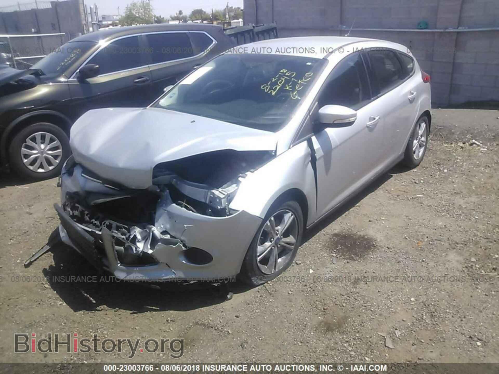 2014 Ford Focus - VIN: 1FADP3K24EL247885 - Фото 2