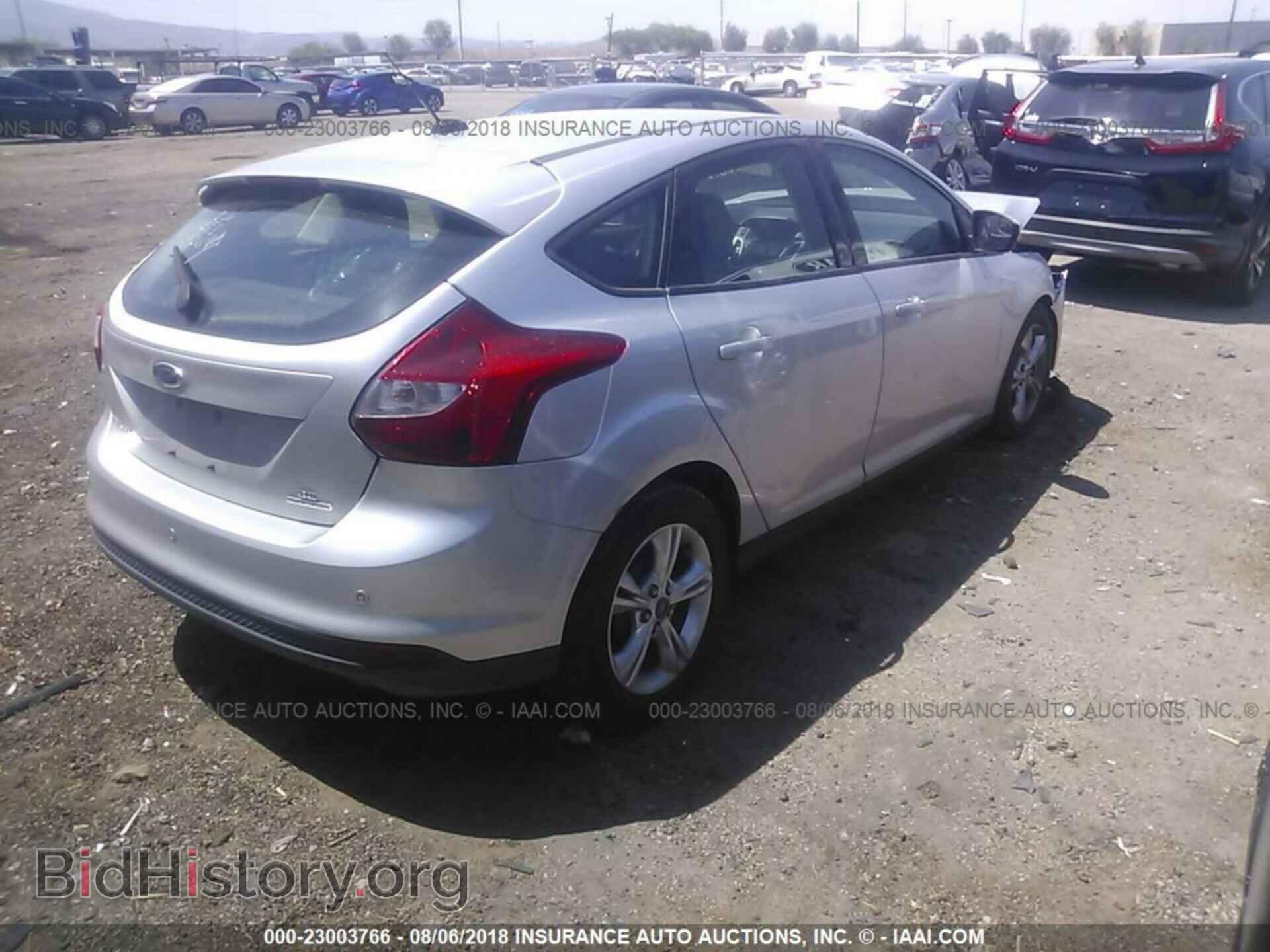 2014 Ford Focus - VIN: 1FADP3K24EL247885 - Фото 4