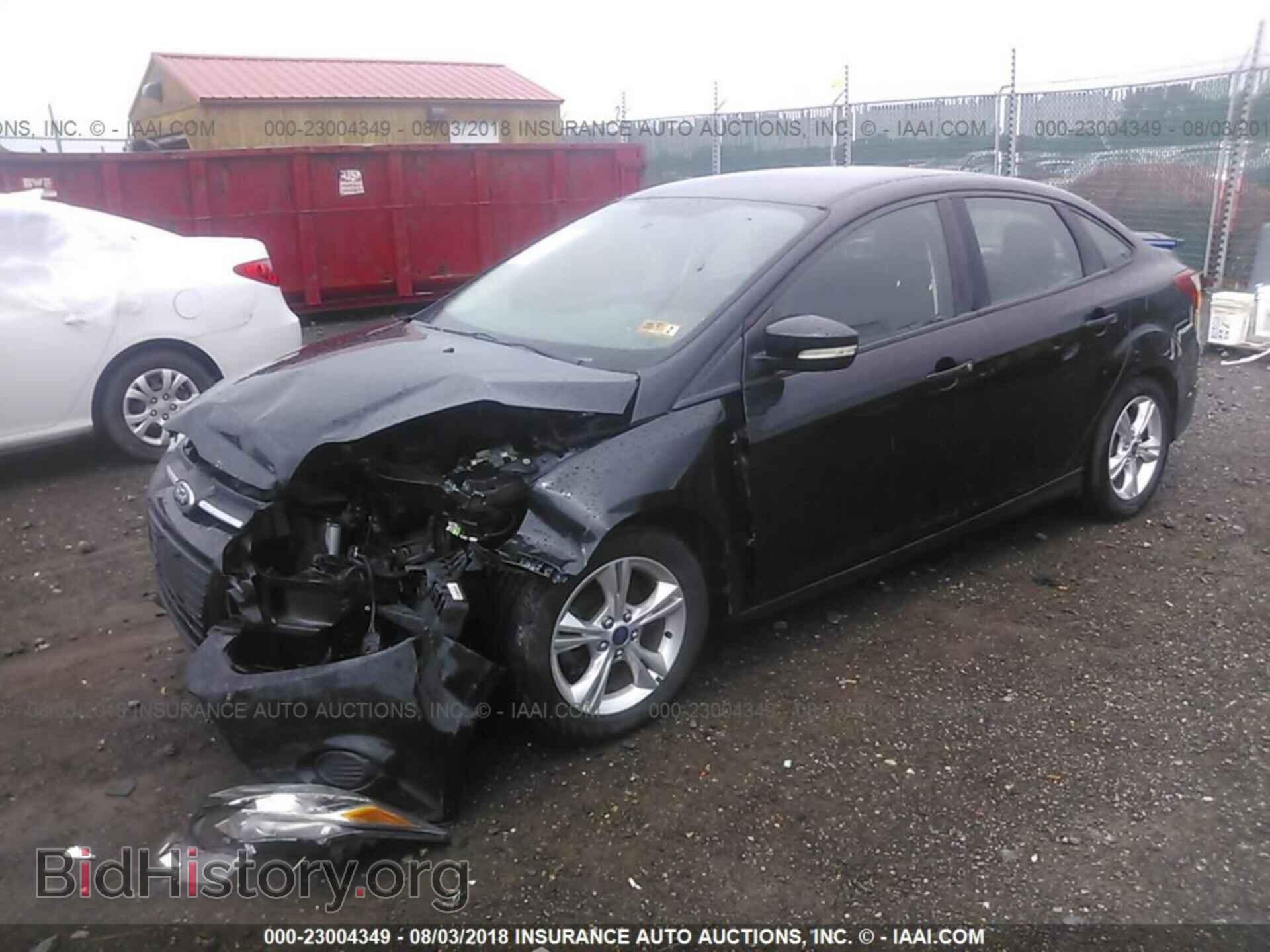 2014 Ford Focus - VIN: 1FADP3F23EL160764 - Photo 2
