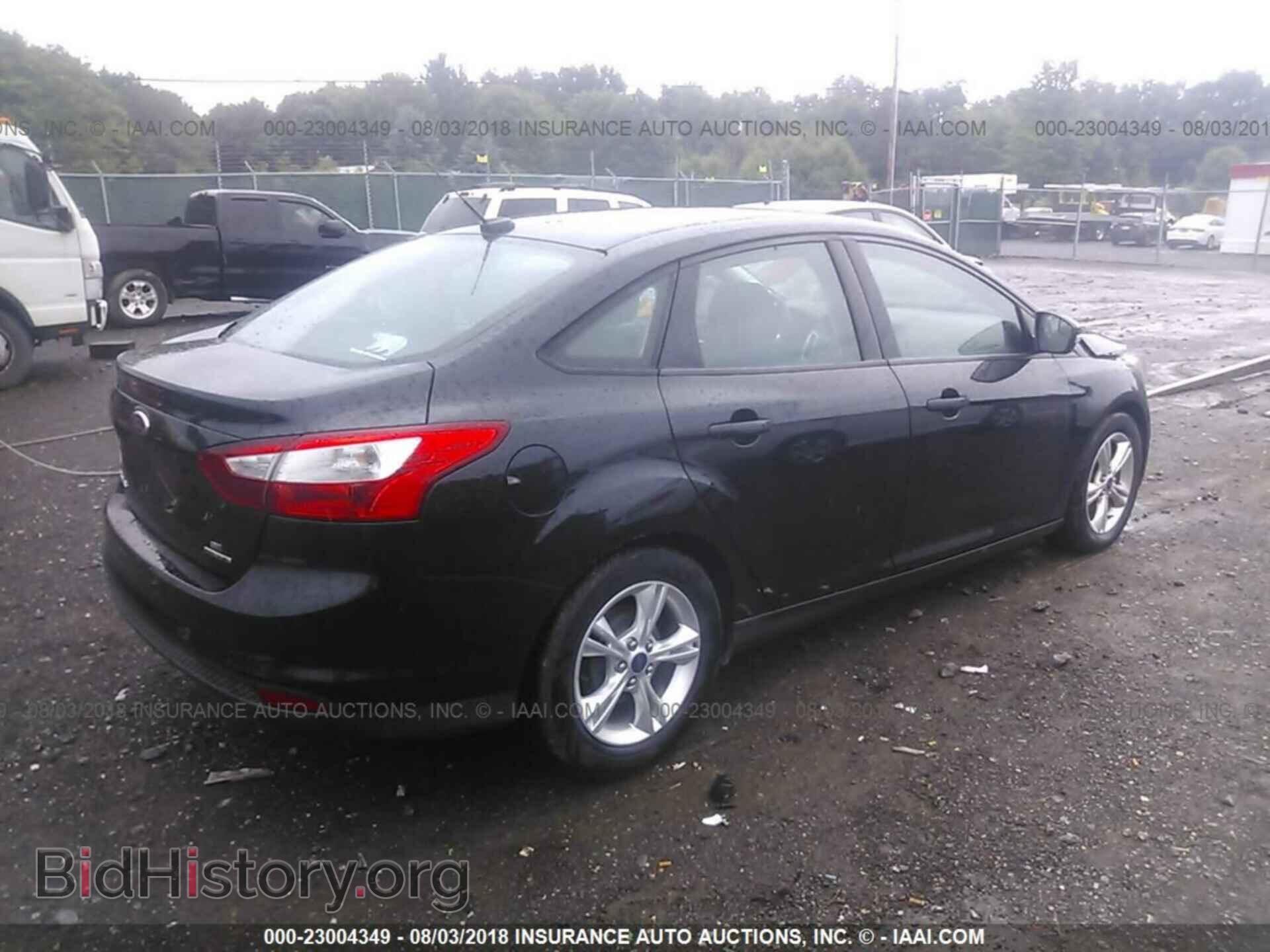 2014 Ford Focus - VIN: 1FADP3F23EL160764 - Photo 4