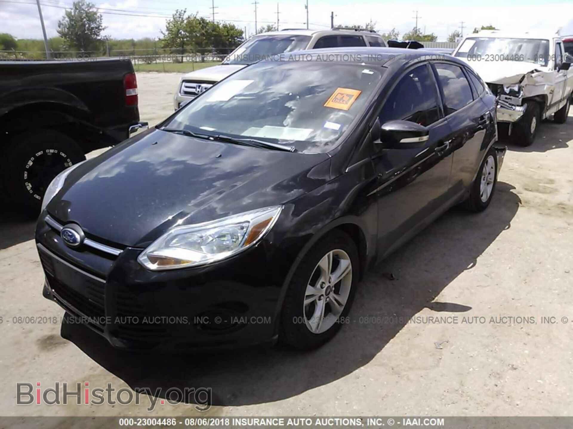 2014 Ford Focus - VIN: 1FADP3F25EL440511 - Фото 2