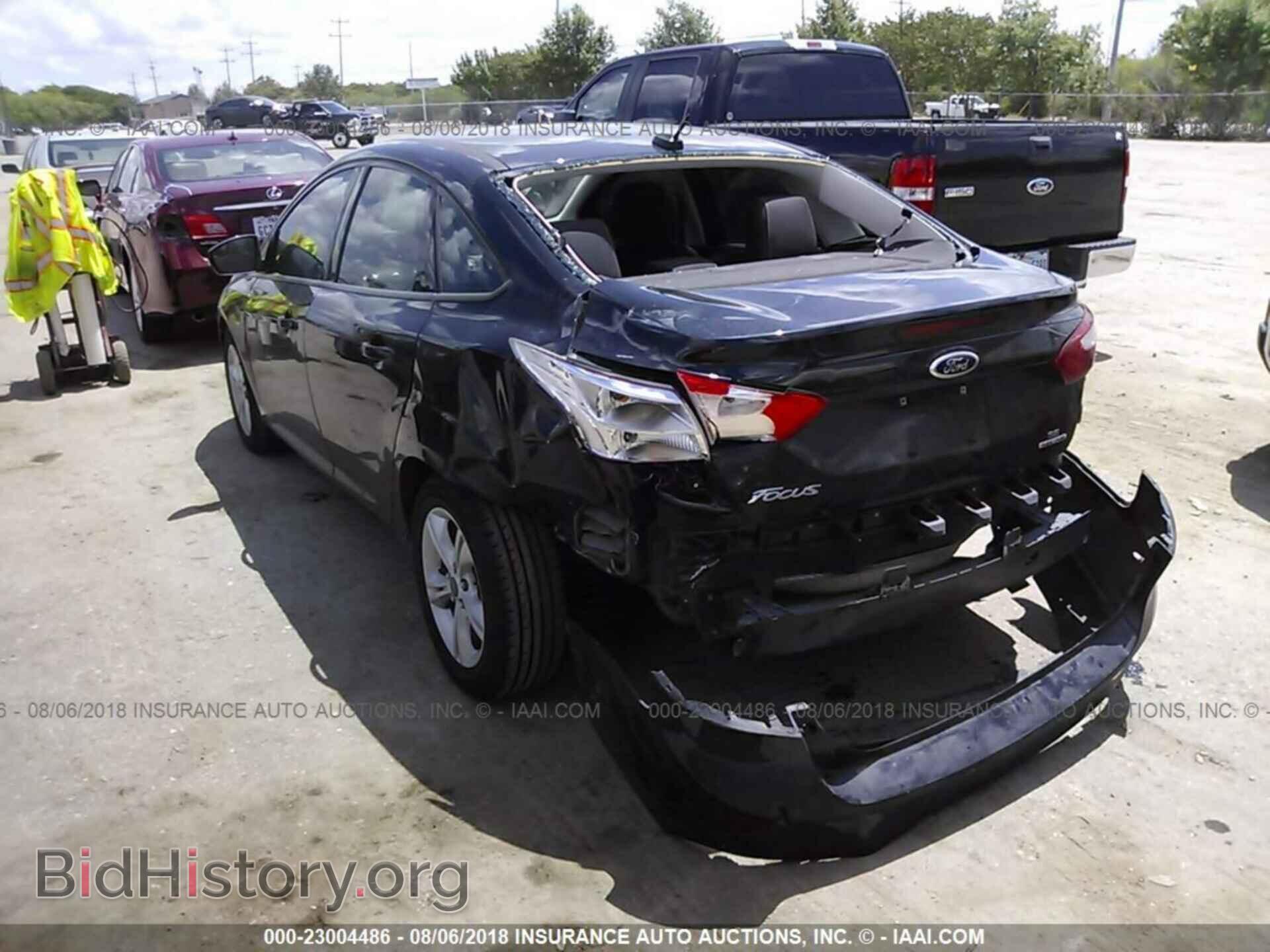 2014 Ford Focus - VIN: 1FADP3F25EL440511 - Фото 3