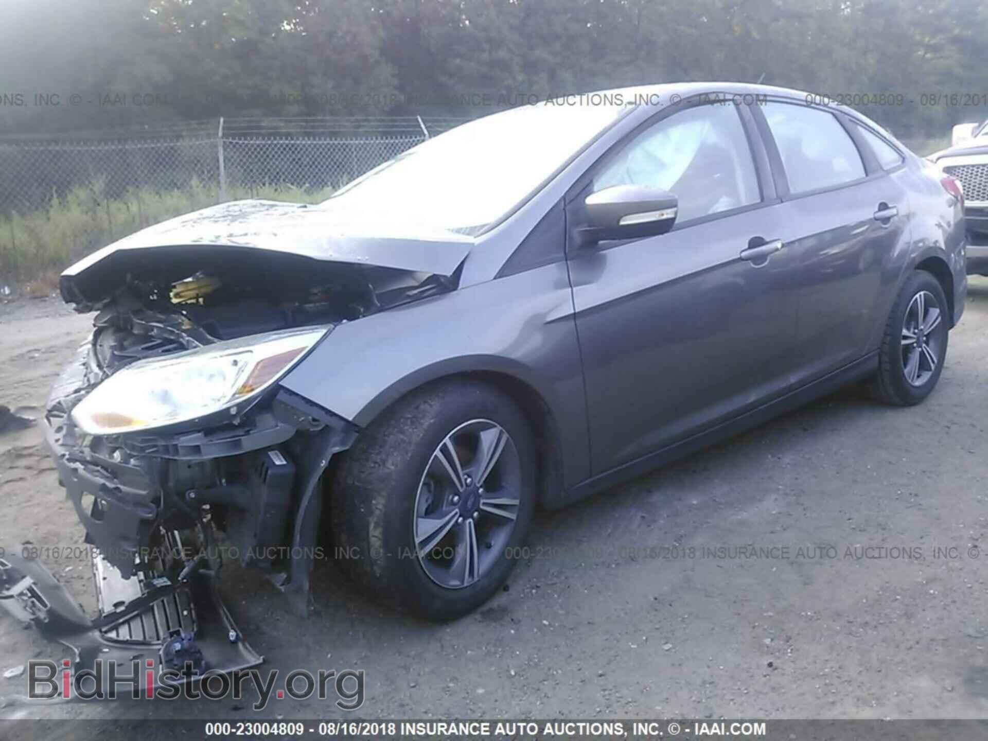 2014 Ford Focus - VIN: 1FADP3F21EL147107 - Фото 2