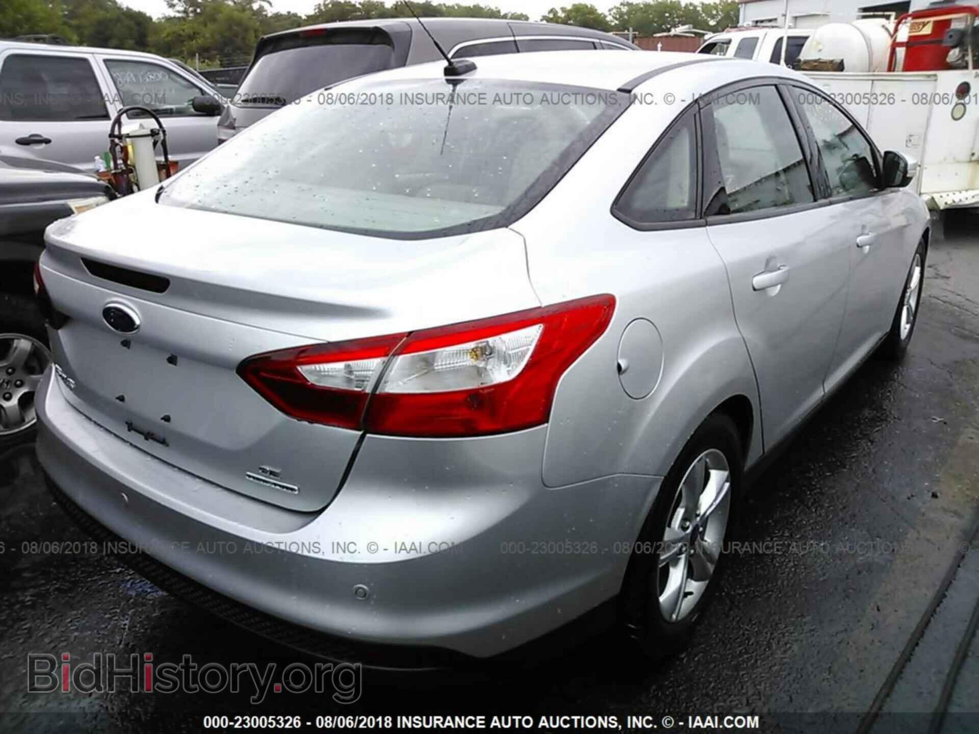 2014 Ford Focus - VIN: 1FADP3F23EL218632 - Фото 4