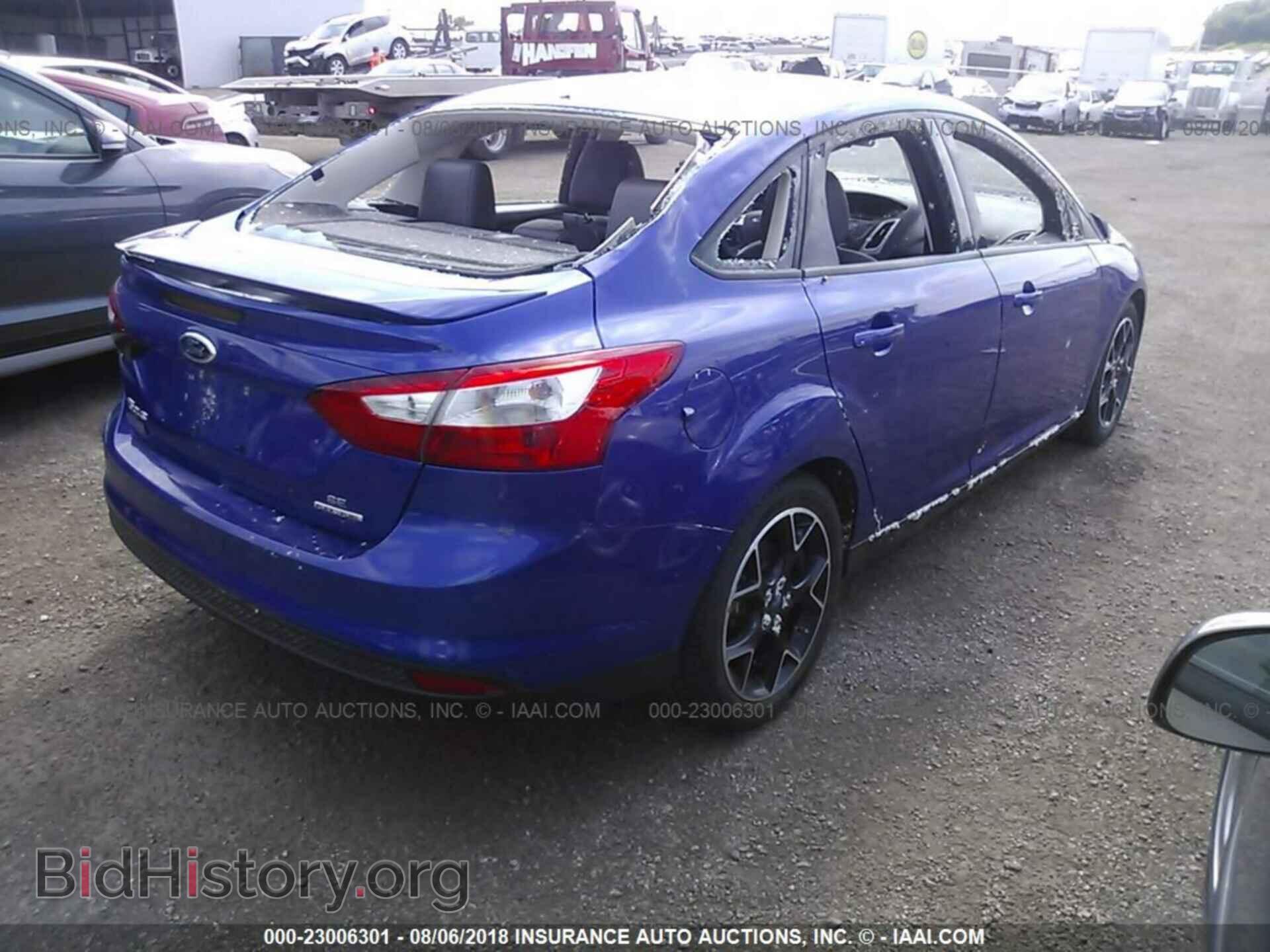 2013 Ford Focus - VIN: 1FADP3F21DL221348 - Photo 4