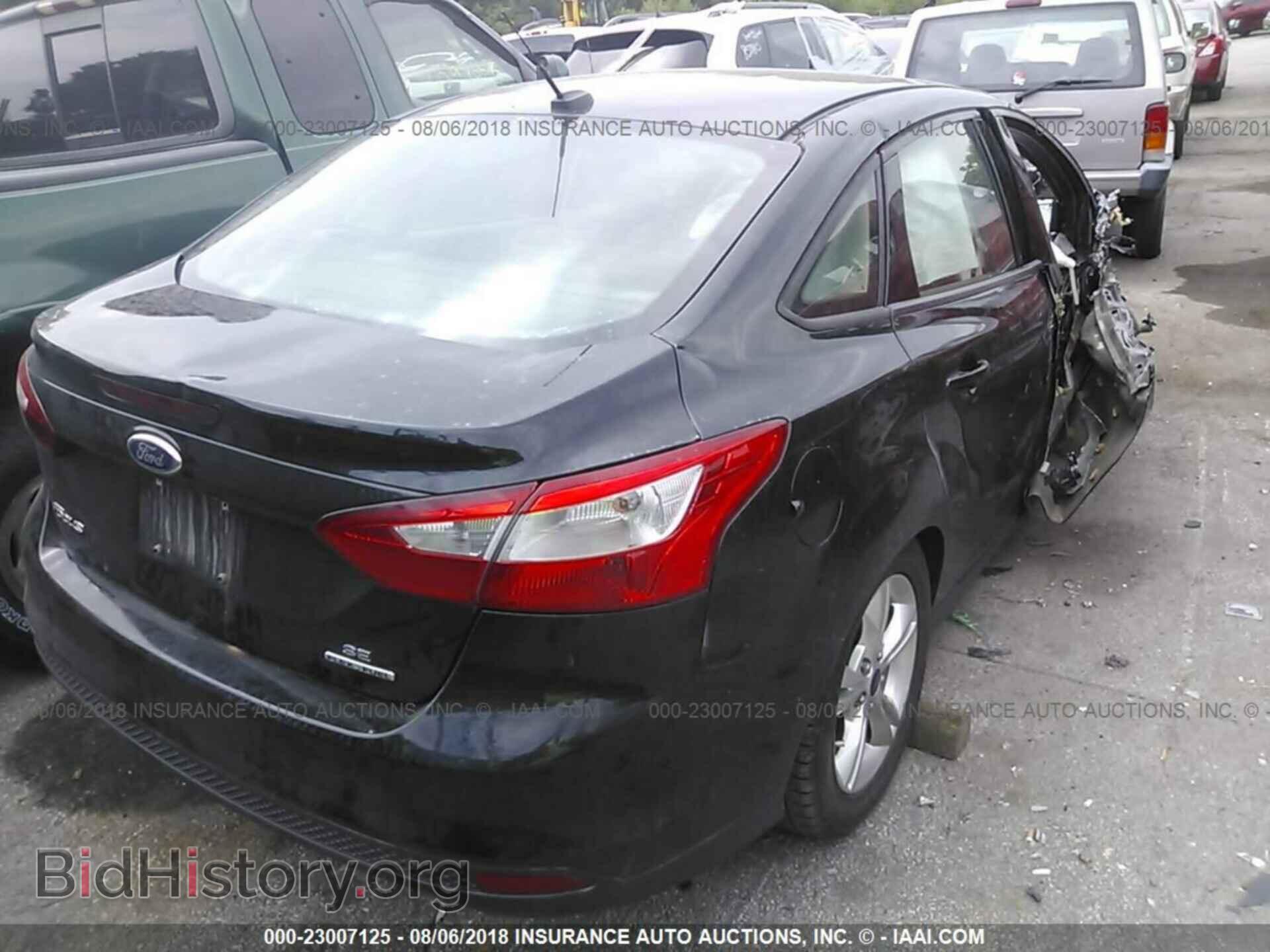2014 Ford Focus - VIN: 1FADP3F23EL249461 - Photo 4