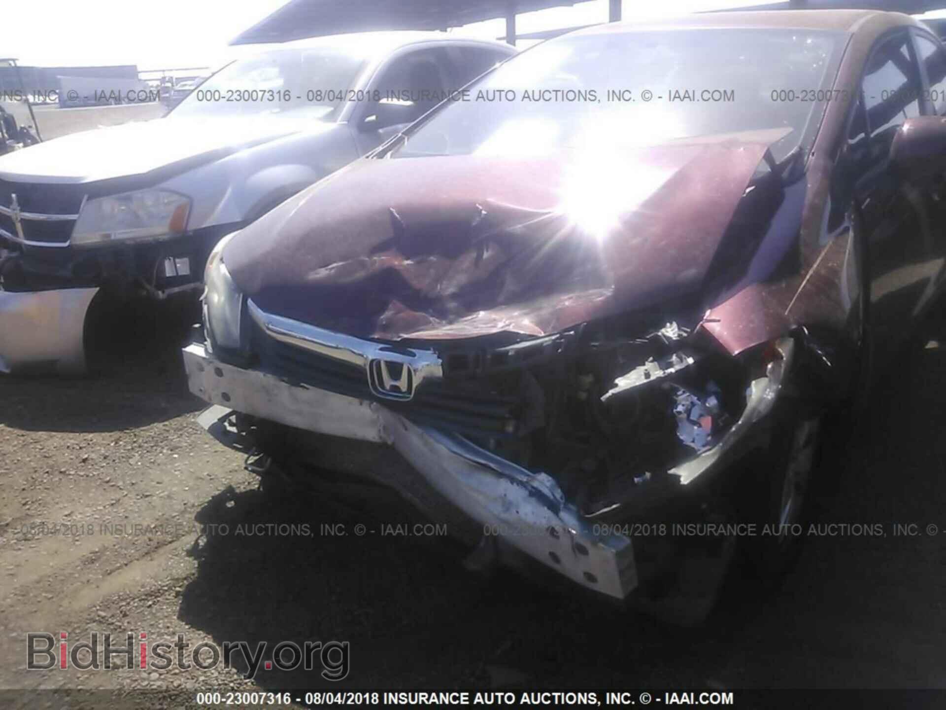 2012 Honda Civic - VIN: 2HGFB2F57CH558996 - Photo 6
