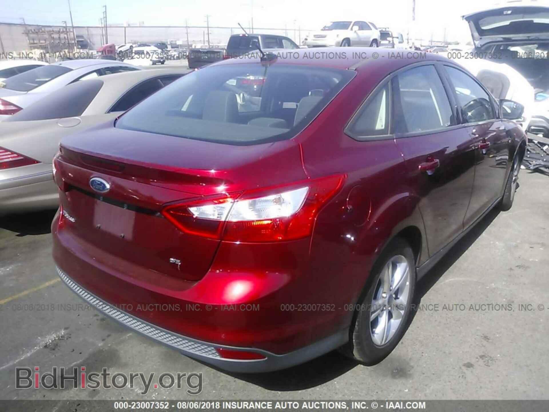 2014 Ford Focus - VIN: 1FADP3F22EL266493 - Photo 4