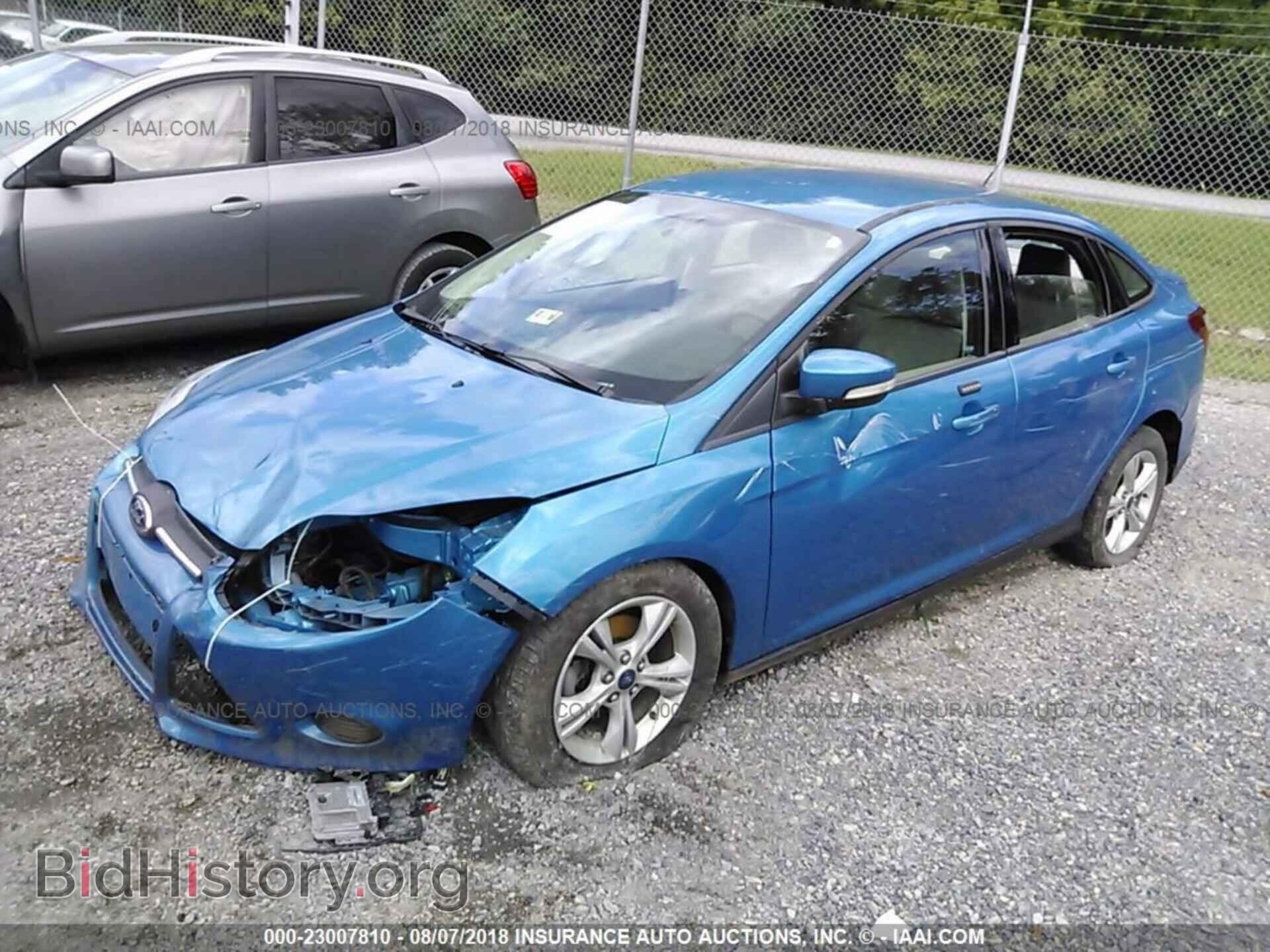 2014 Ford Focus - VIN: 1FADP3F27EL405209 - Фото 2