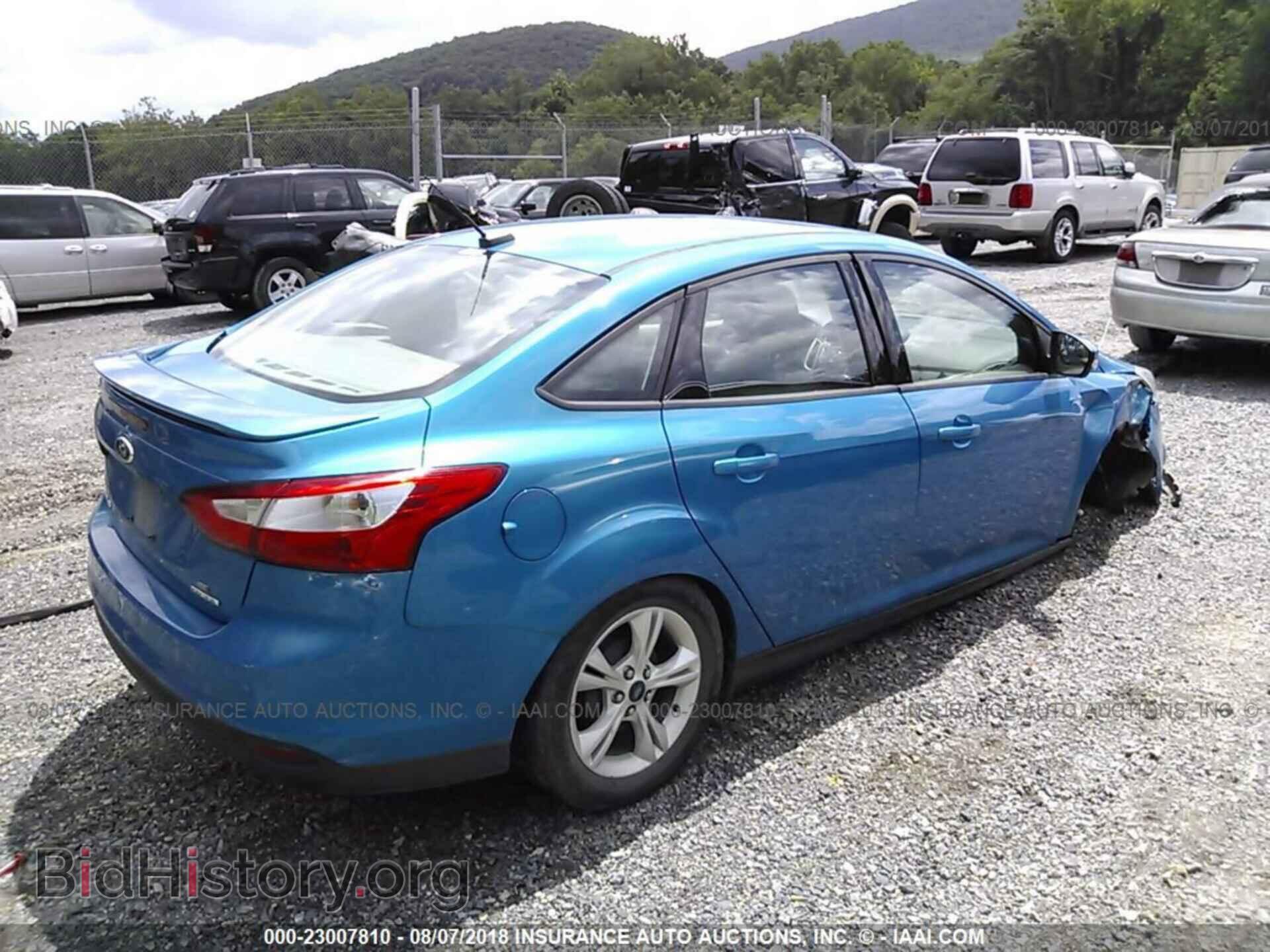 2014 Ford Focus - VIN: 1FADP3F27EL405209 - Фото 4