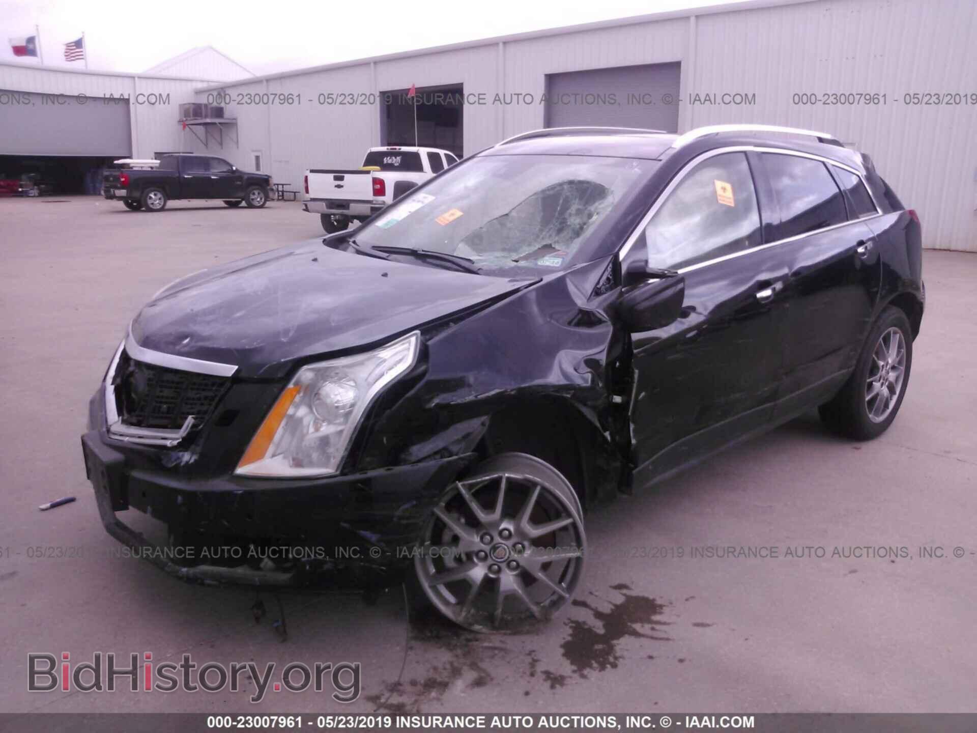 2014 CADILLAC SRX - VIN: 3GYFNDE33ES572793 - Фото 2
