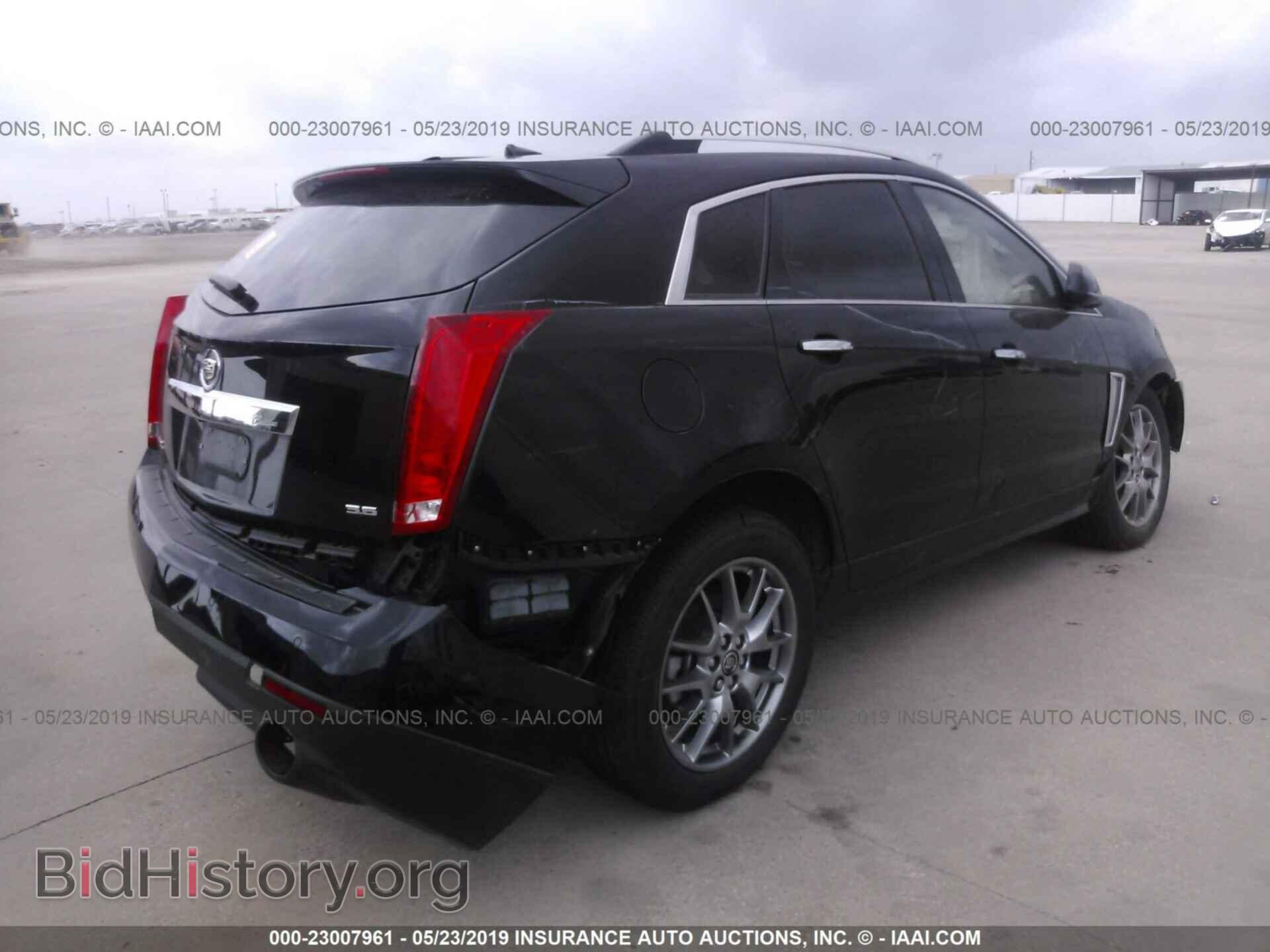 2014 CADILLAC SRX - VIN: 3GYFNDE33ES572793 - Фото 4