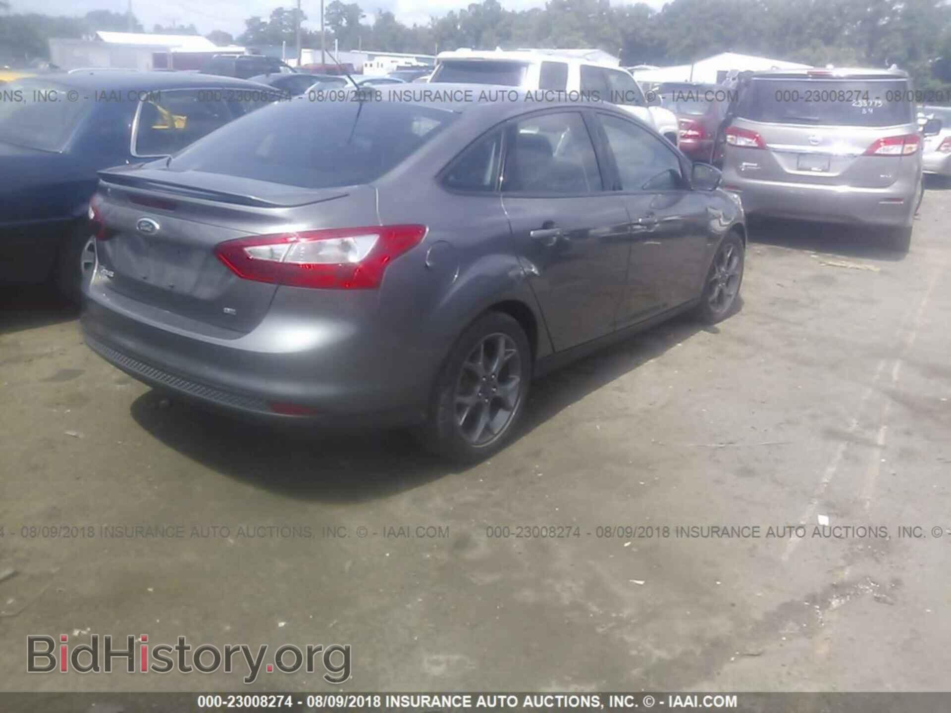 2013 Ford Focus - VIN: 1FADP3F2XDL331833 - Photo 4