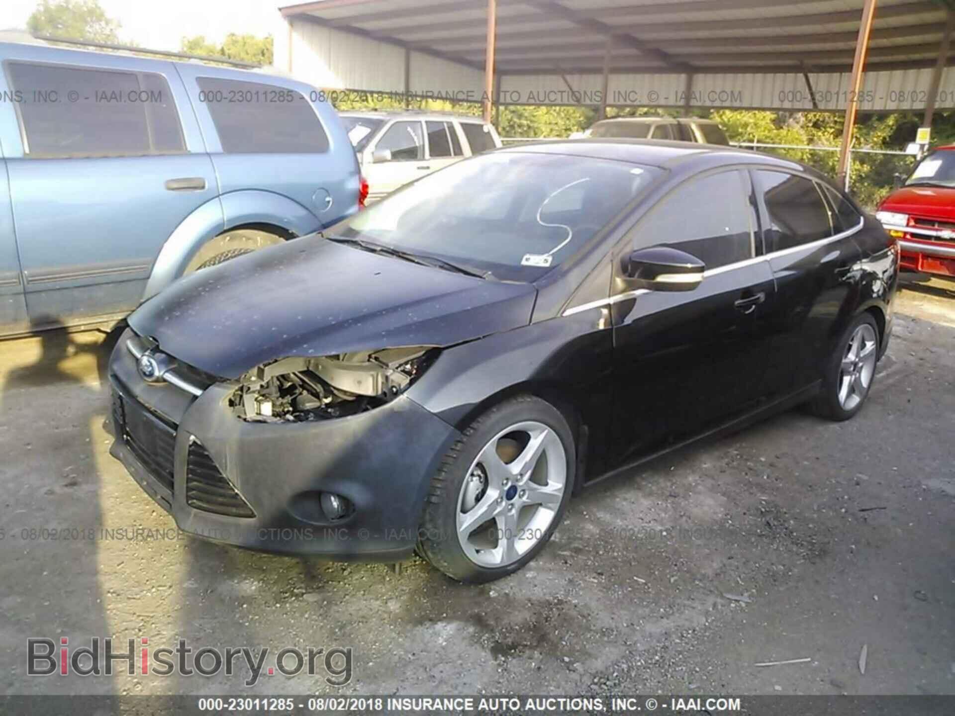 2014 Ford Focus - VIN: 1FADP3J20EL183314 - Фото 2