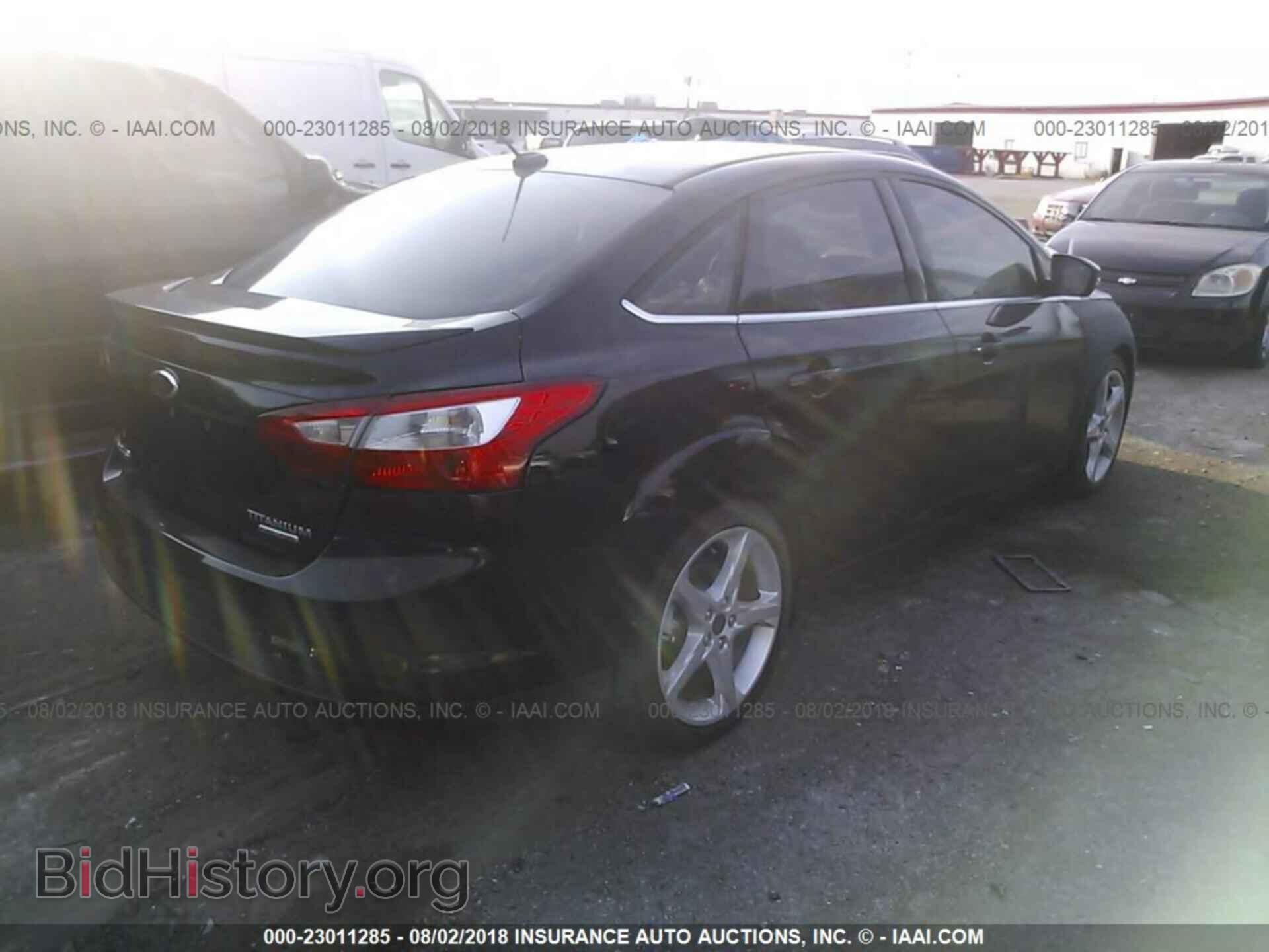 2014 Ford Focus - VIN: 1FADP3J20EL183314 - Фото 4