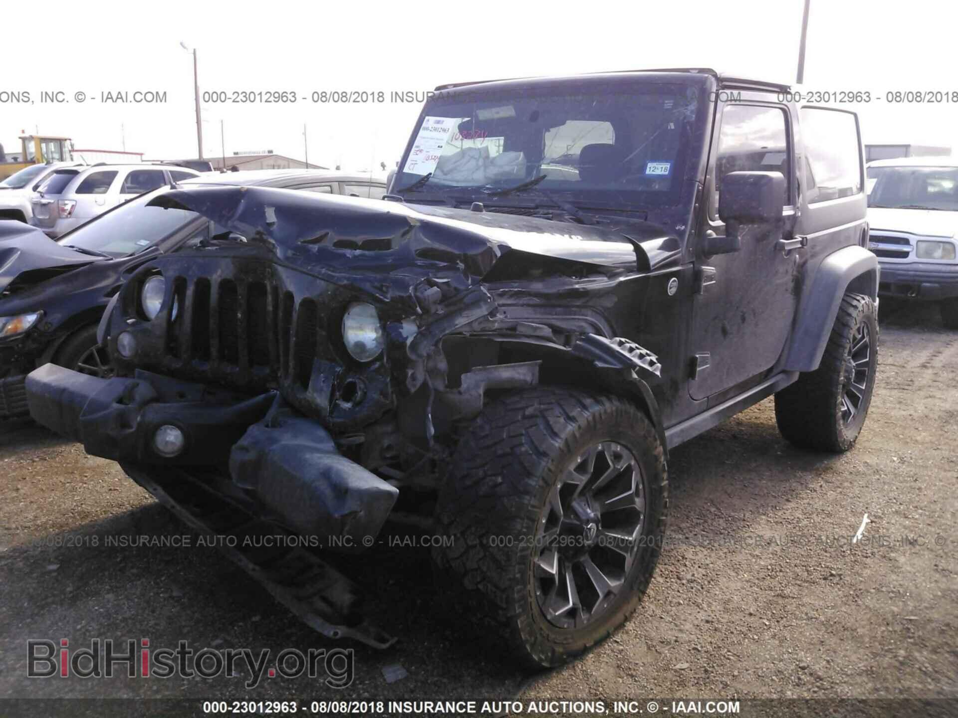 2014 Jeep Wrangler - VIN: 1C4AJWAG4EL219291 - Фото 2