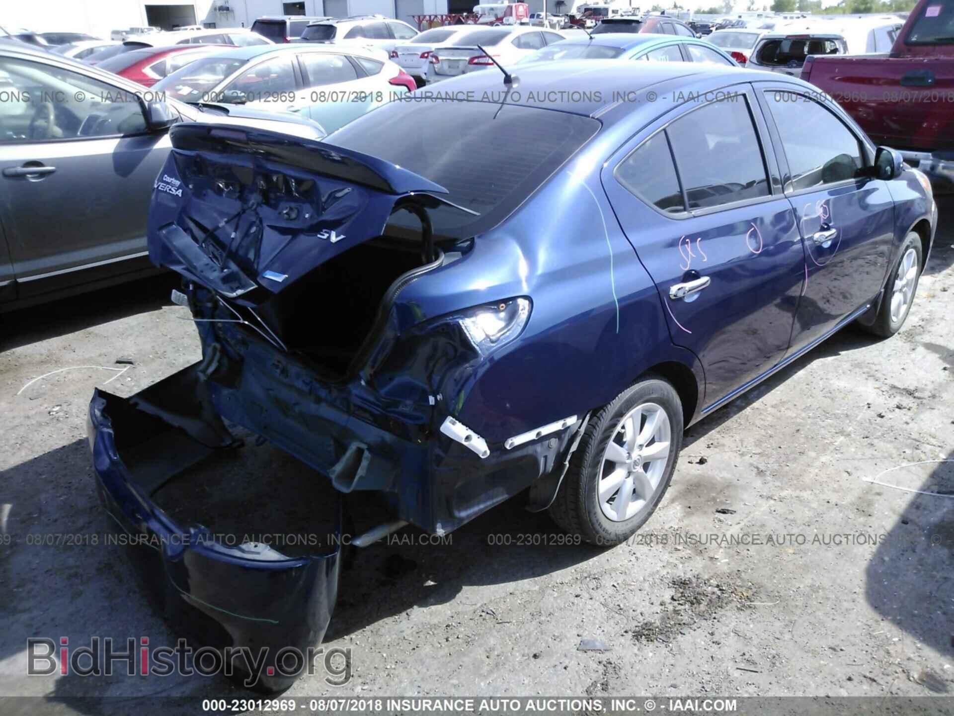 2014 Nissan Versa - VIN: 3N1CN7AP0EL841297 - Фото 4