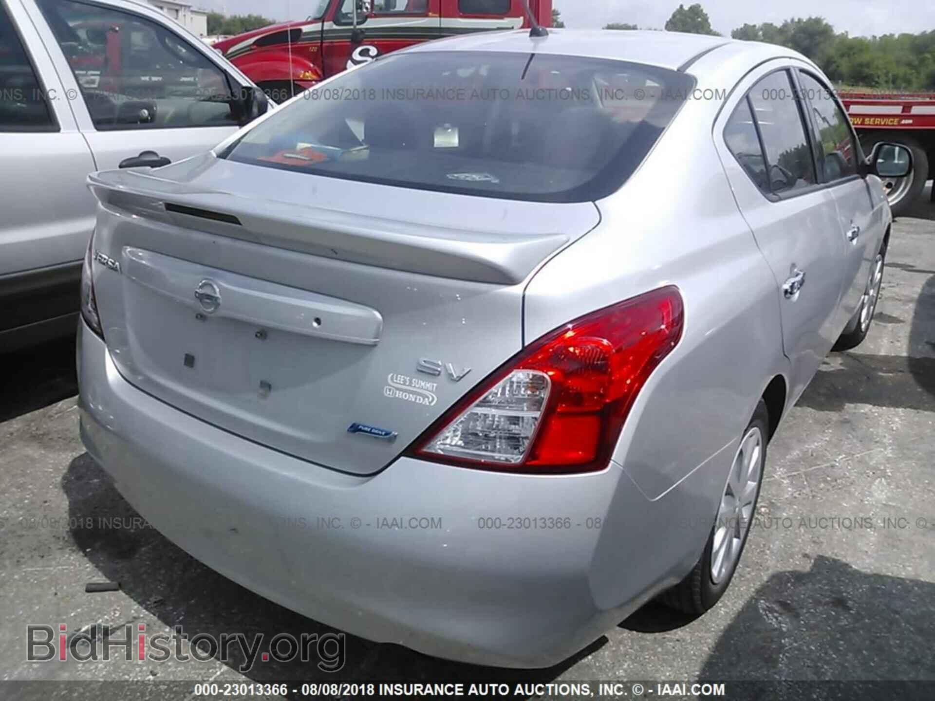 2014 Nissan Versa - VIN: 3N1CN7APXEL837225 - Photo 4
