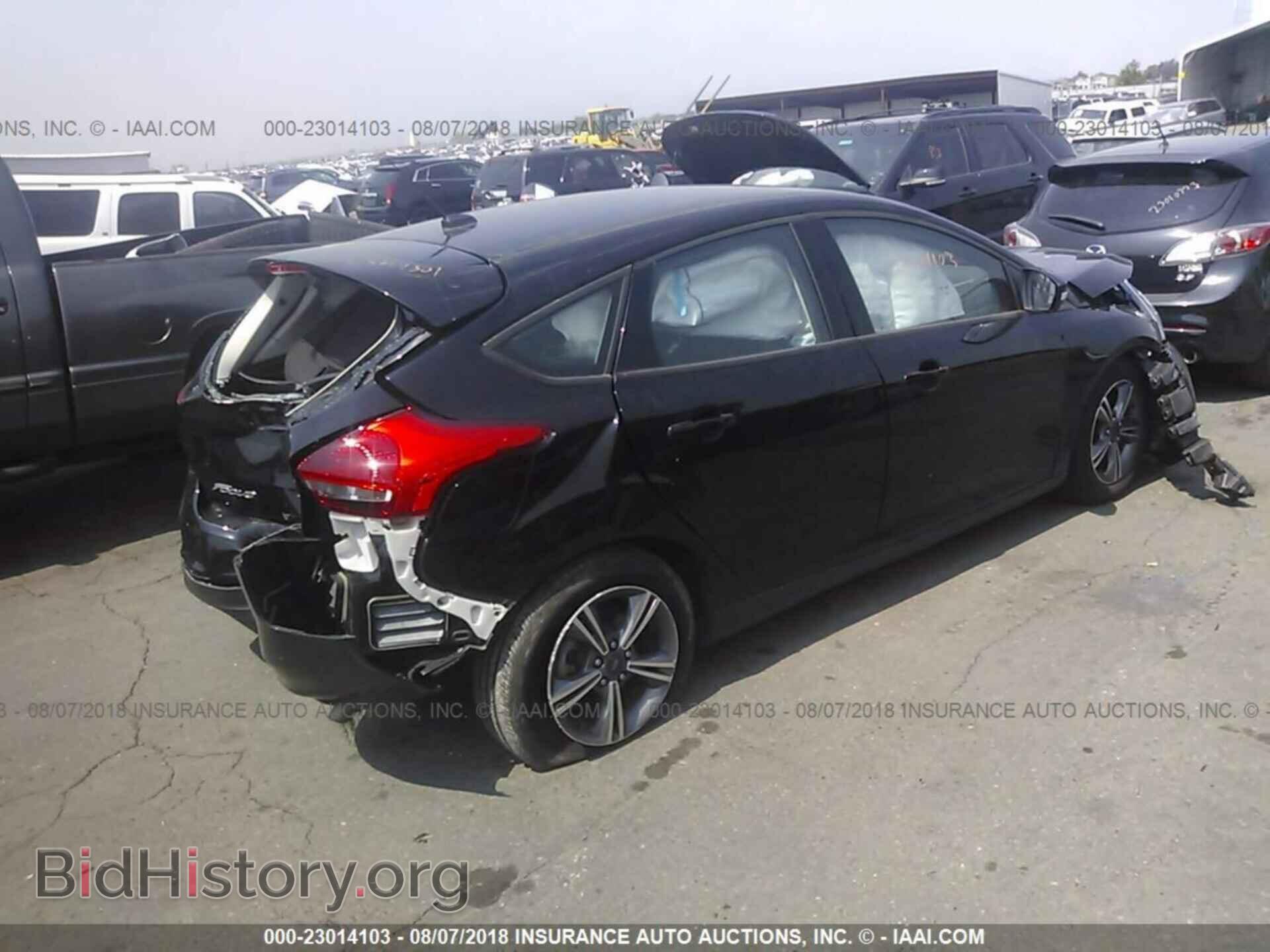 2016 Ford Focus - VIN: 1FADP3KEXGL405191 - Photo 4
