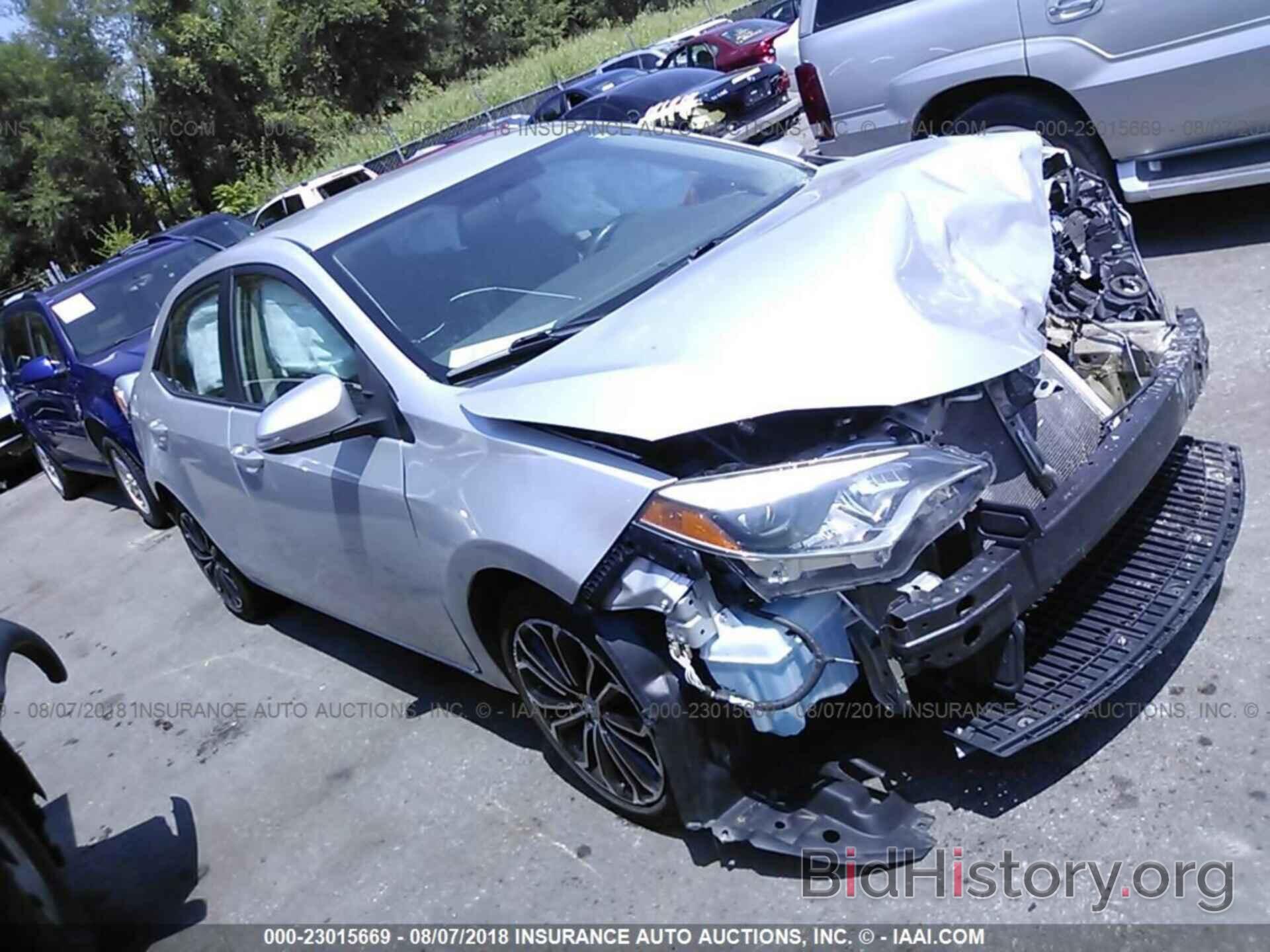 Photo 5YFBURHE0EP162662 - Toyota Corolla 2014