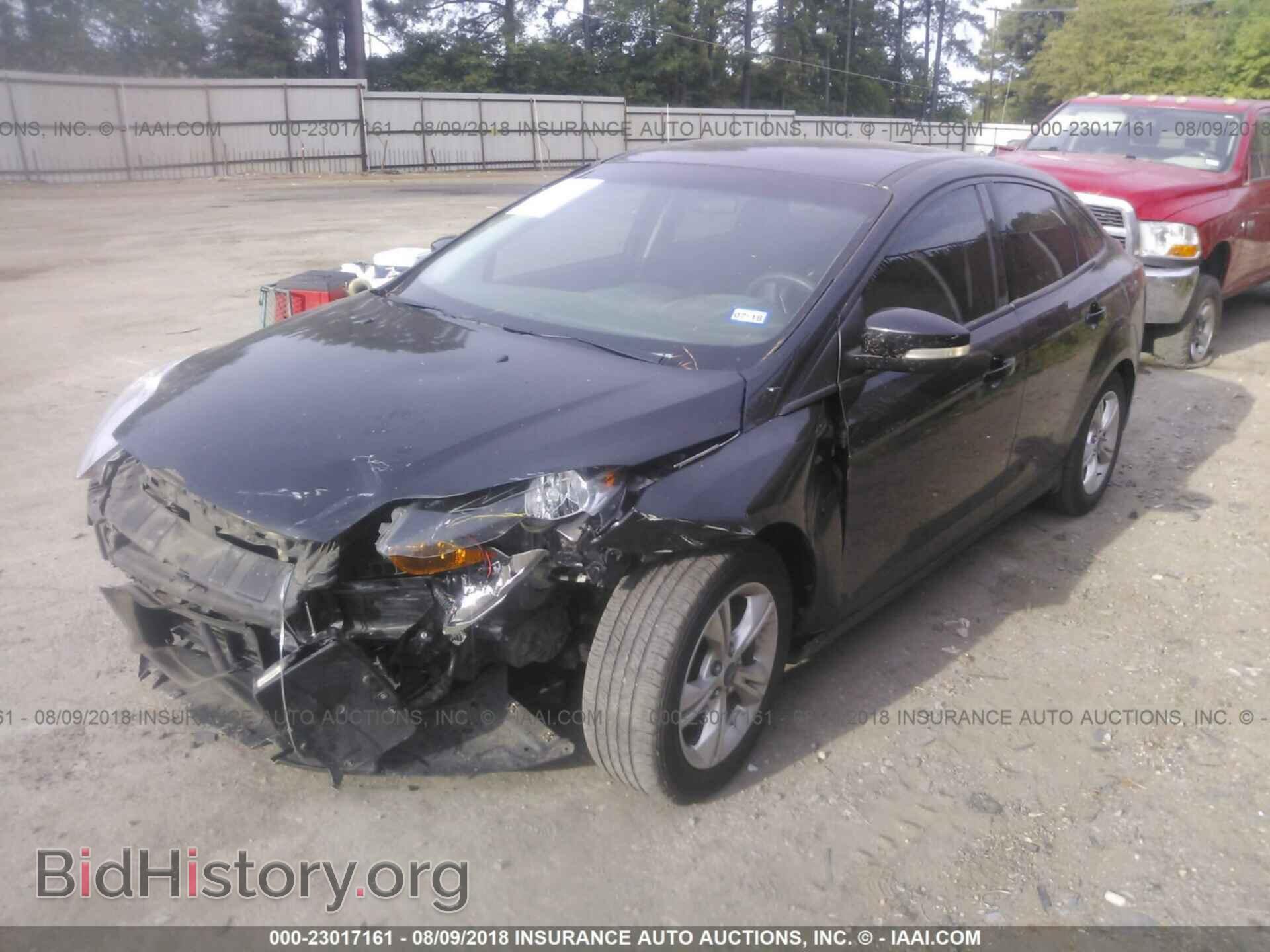 2014 Ford Focus - VIN: 1FADP3F20EL139922 - Фото 2