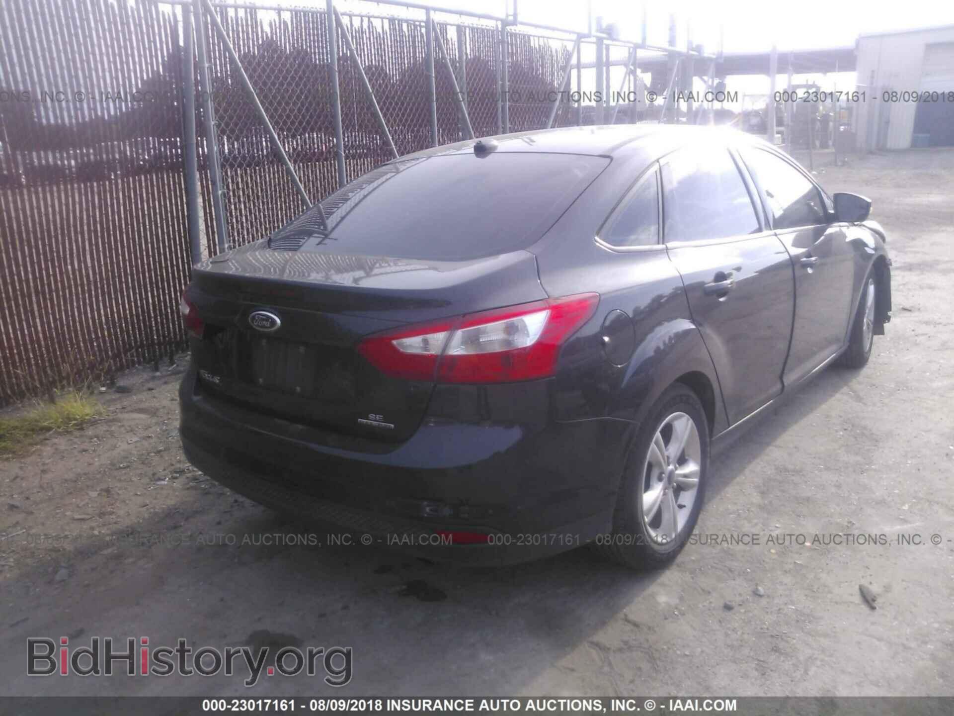 2014 Ford Focus - VIN: 1FADP3F20EL139922 - Фото 4