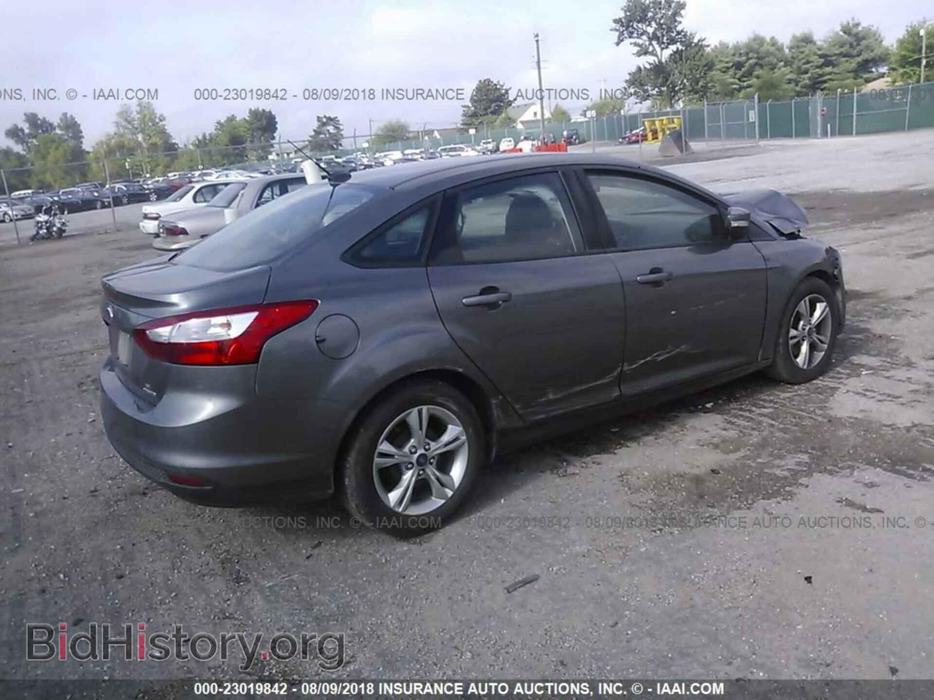 2014 Ford Focus - VIN: 1FADP3F24EL253034 - Photo 4