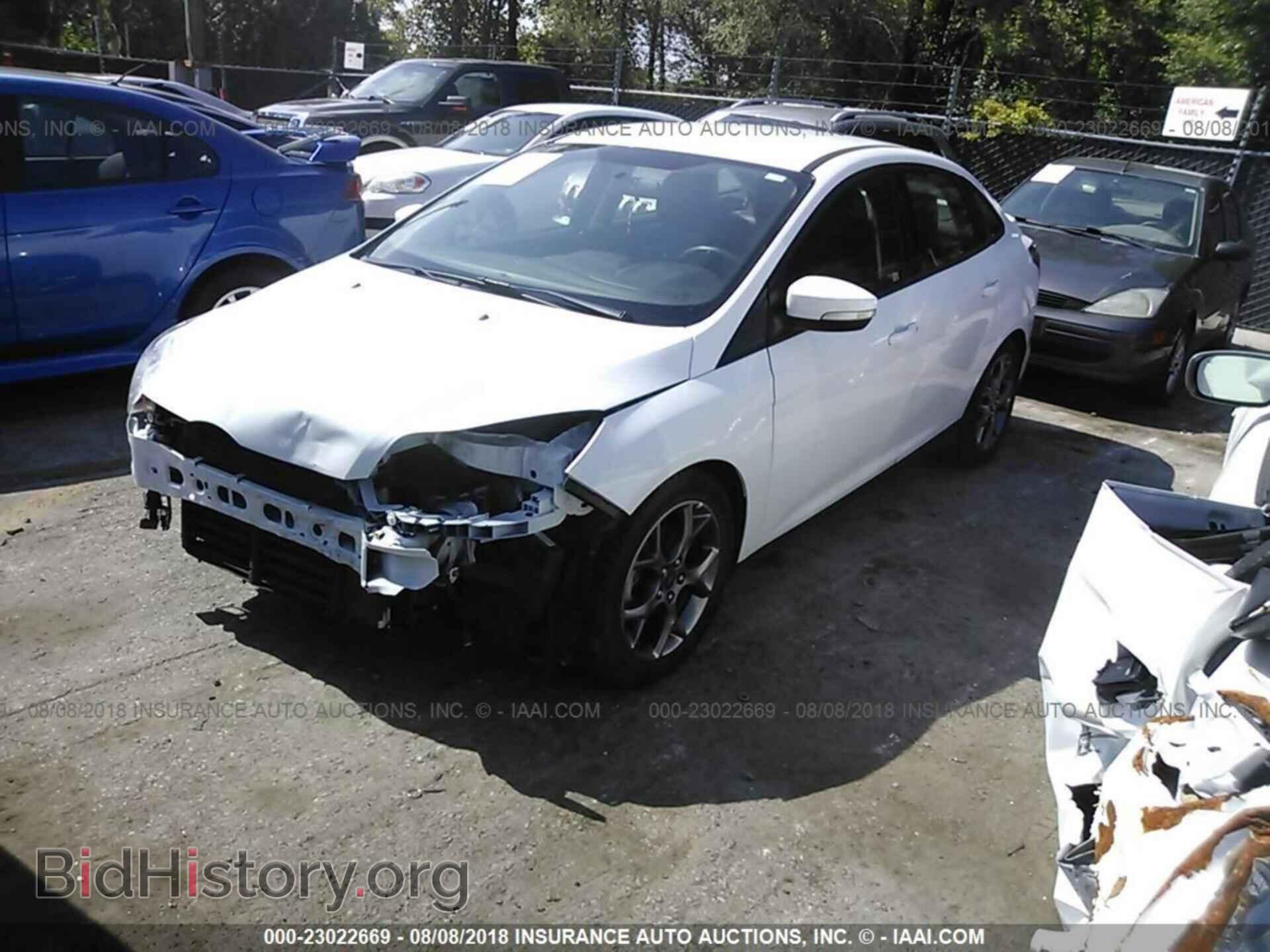 2014 Ford Focus - VIN: 1FADP3F2XEL327458 - Photo 2