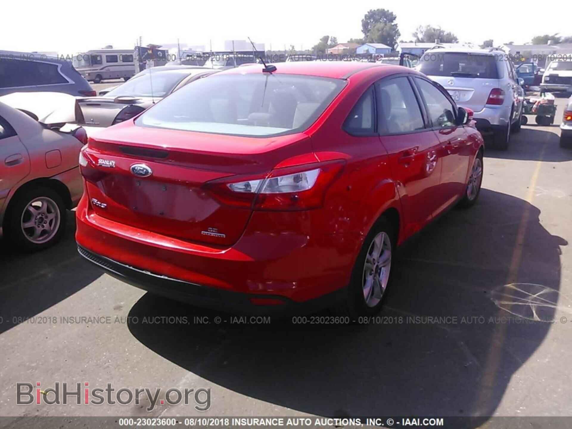 2014 Ford Focus - VIN: 1FADP3F24EL336432 - Photo 4