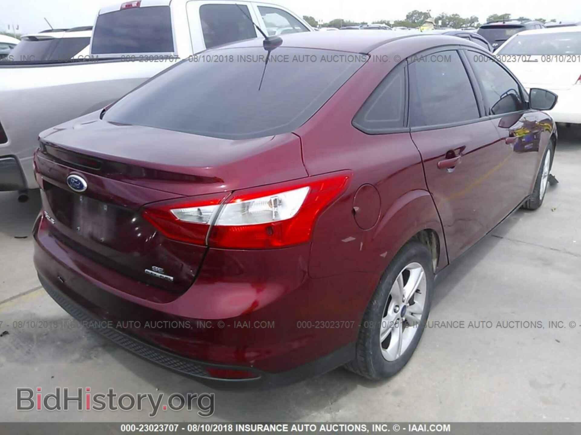 2014 Ford Focus - VIN: 1FADP3F22EL440076 - Фото 4