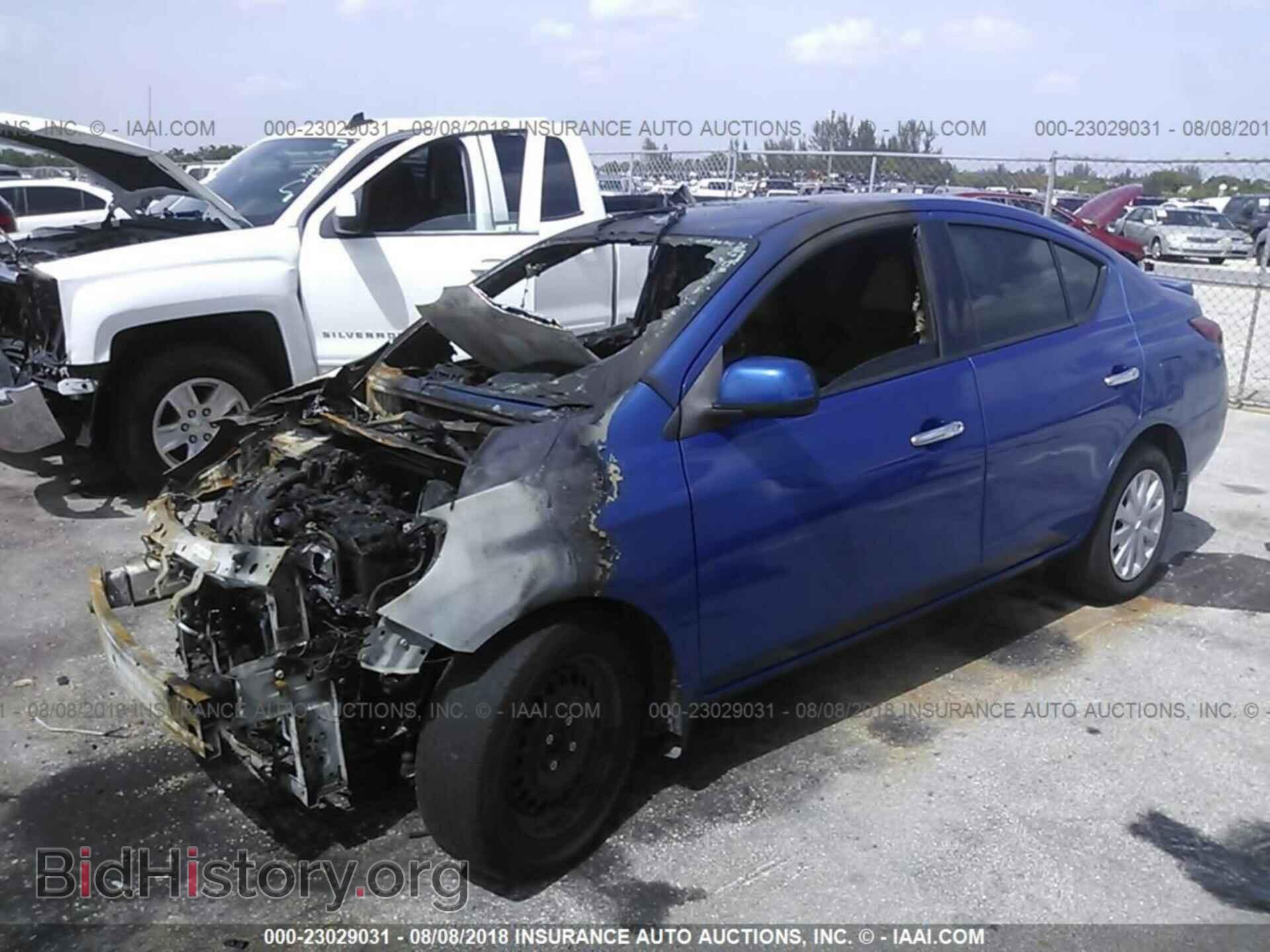 2014 Nissan Versa - VIN: 3N1CN7AP8EL800724 - Фото 2